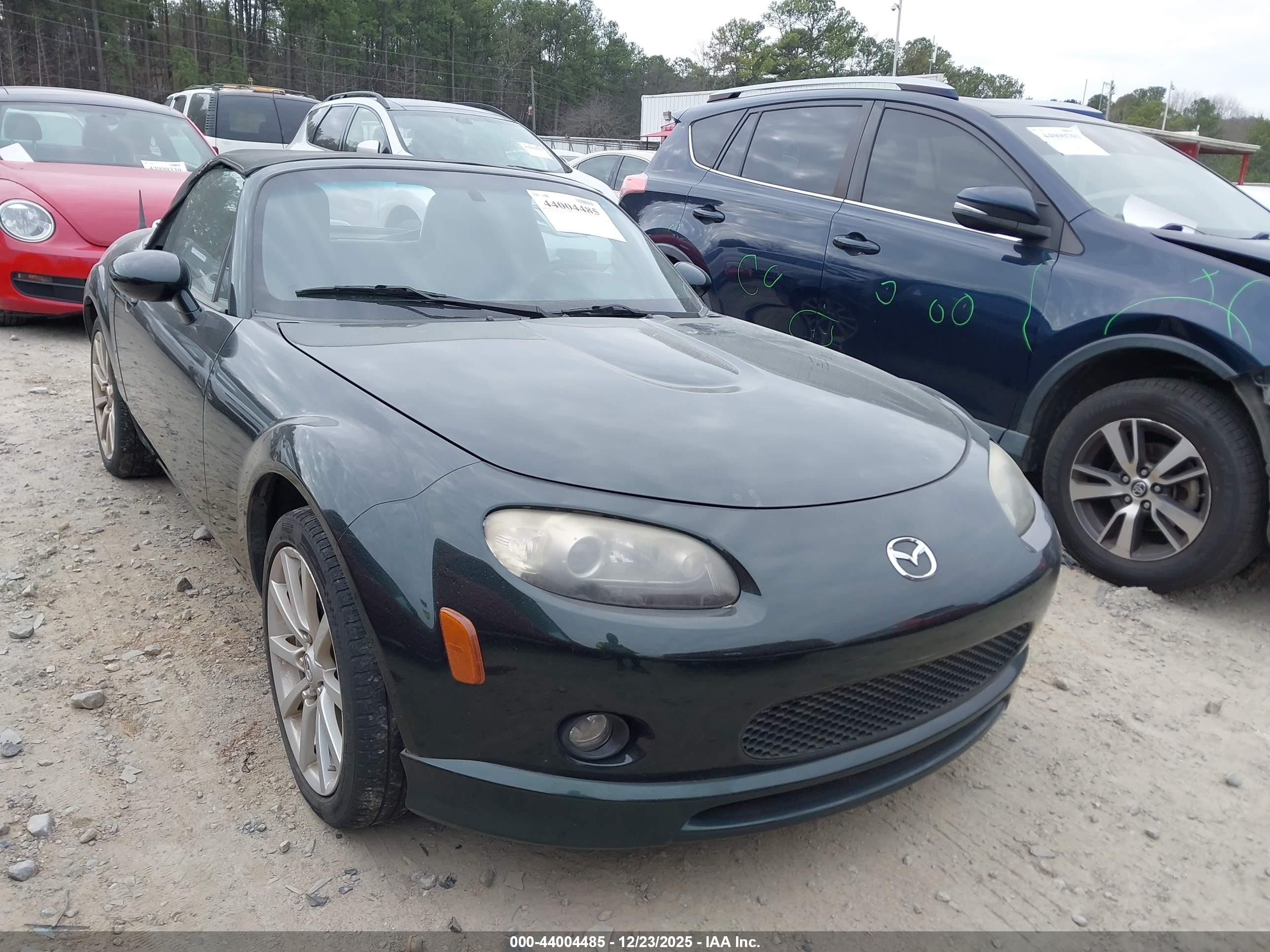 2008 Mazda MX-5 Miata Touring, VIN JM1NC25F680141723 — Side