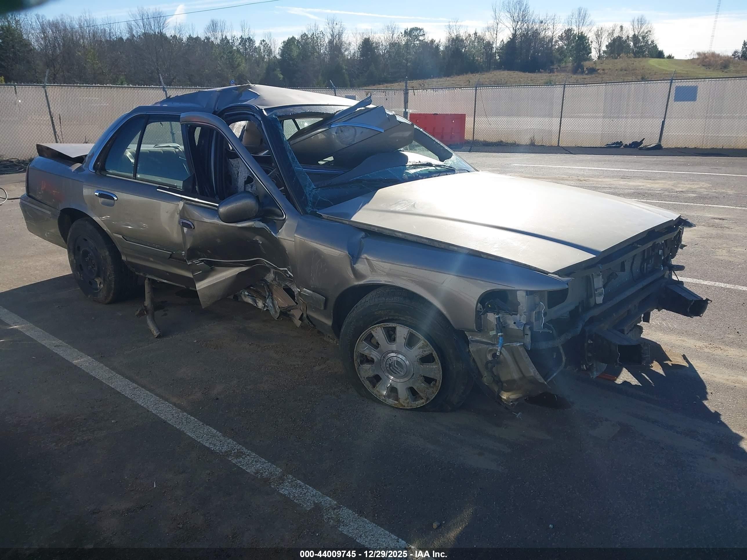 2003 Mercury Grand Marquis GS Convenience, VIN 2MEFM74W33X645008 — Rollover