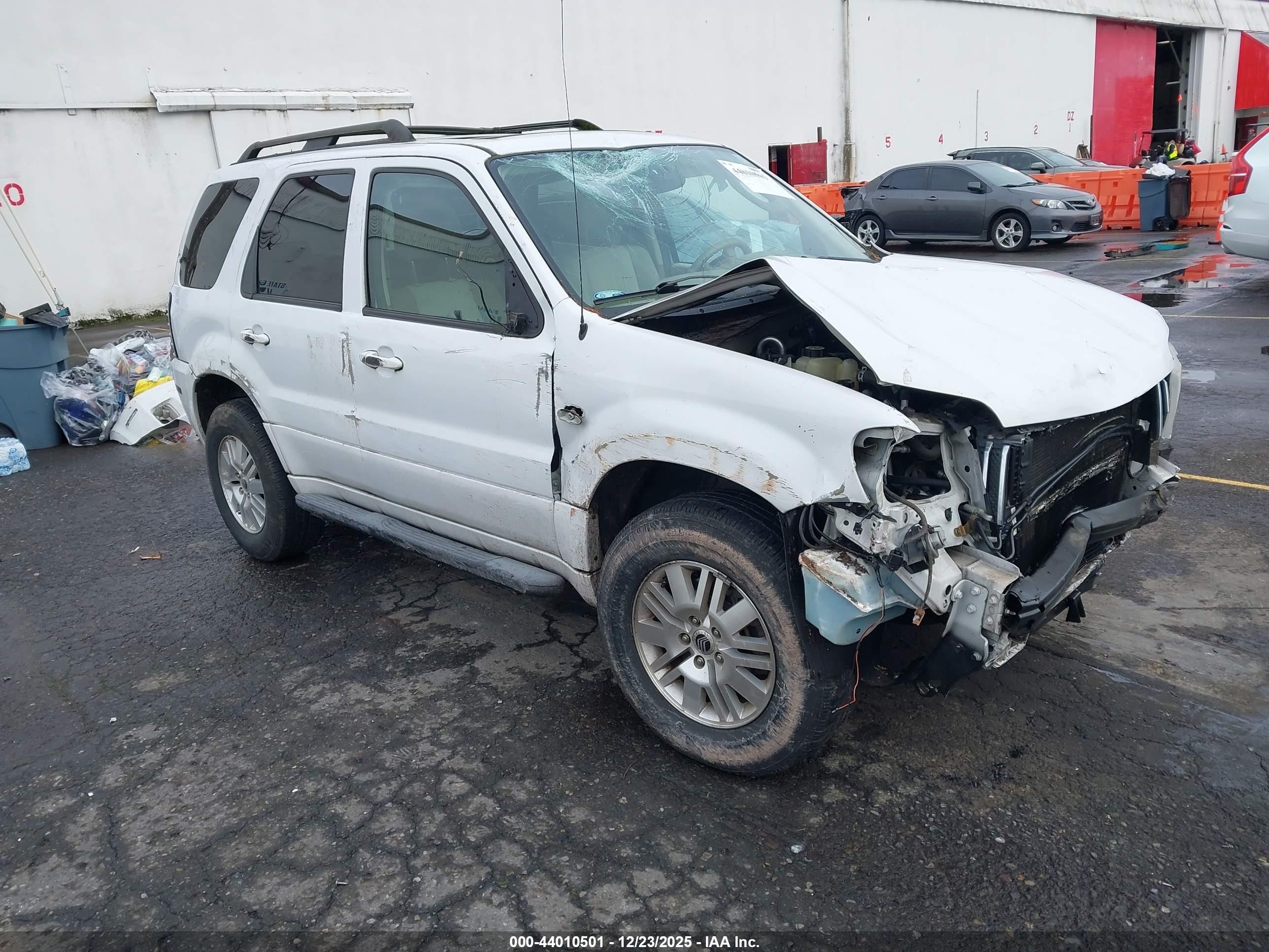 2005 Mercury Mariner Luxury, VIN 4M2CU57125DJ24987 — Rollover