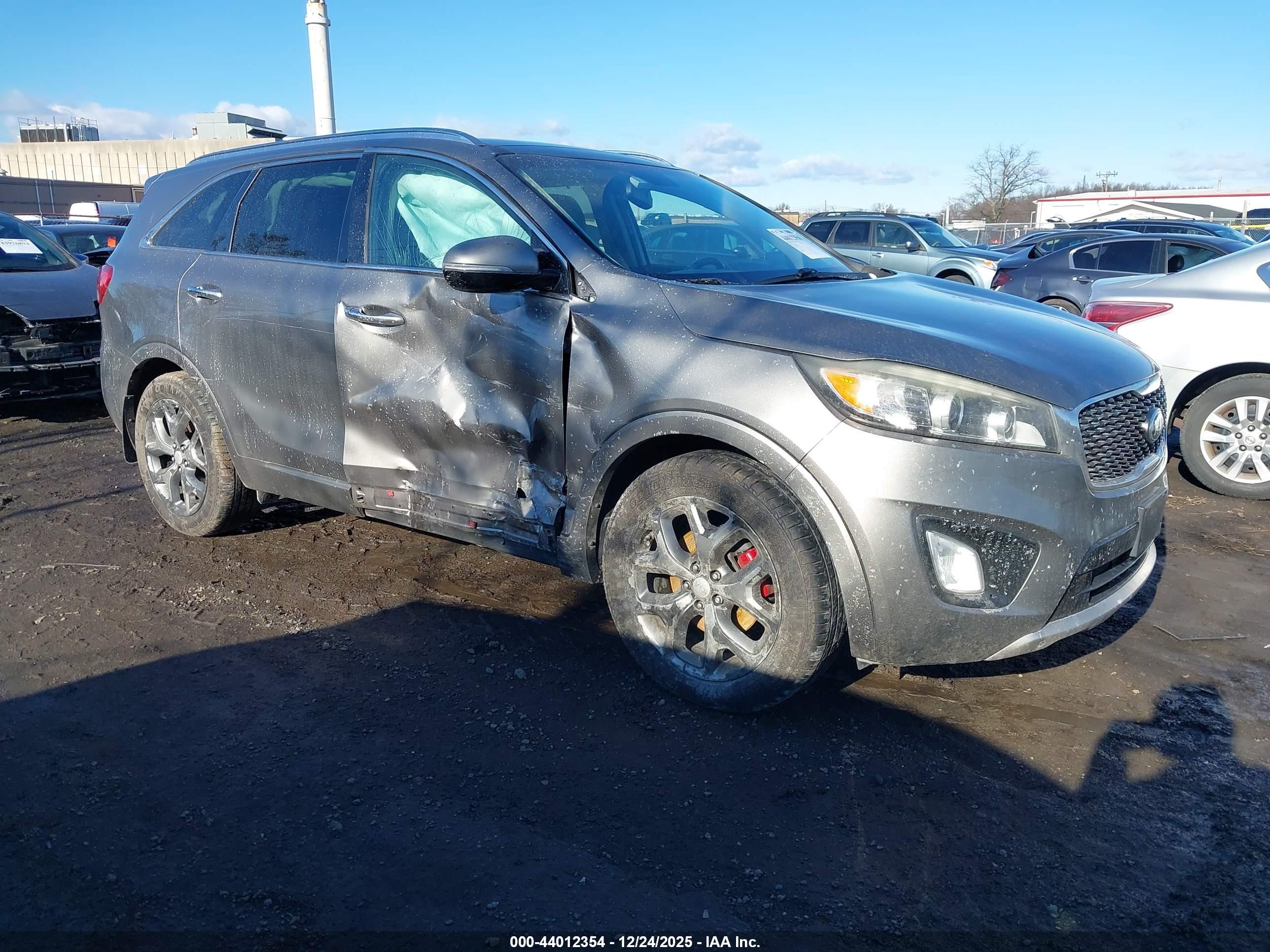 2016 Kia Sorento SX, VIN 5XYPKDA59GG068408 — Side
