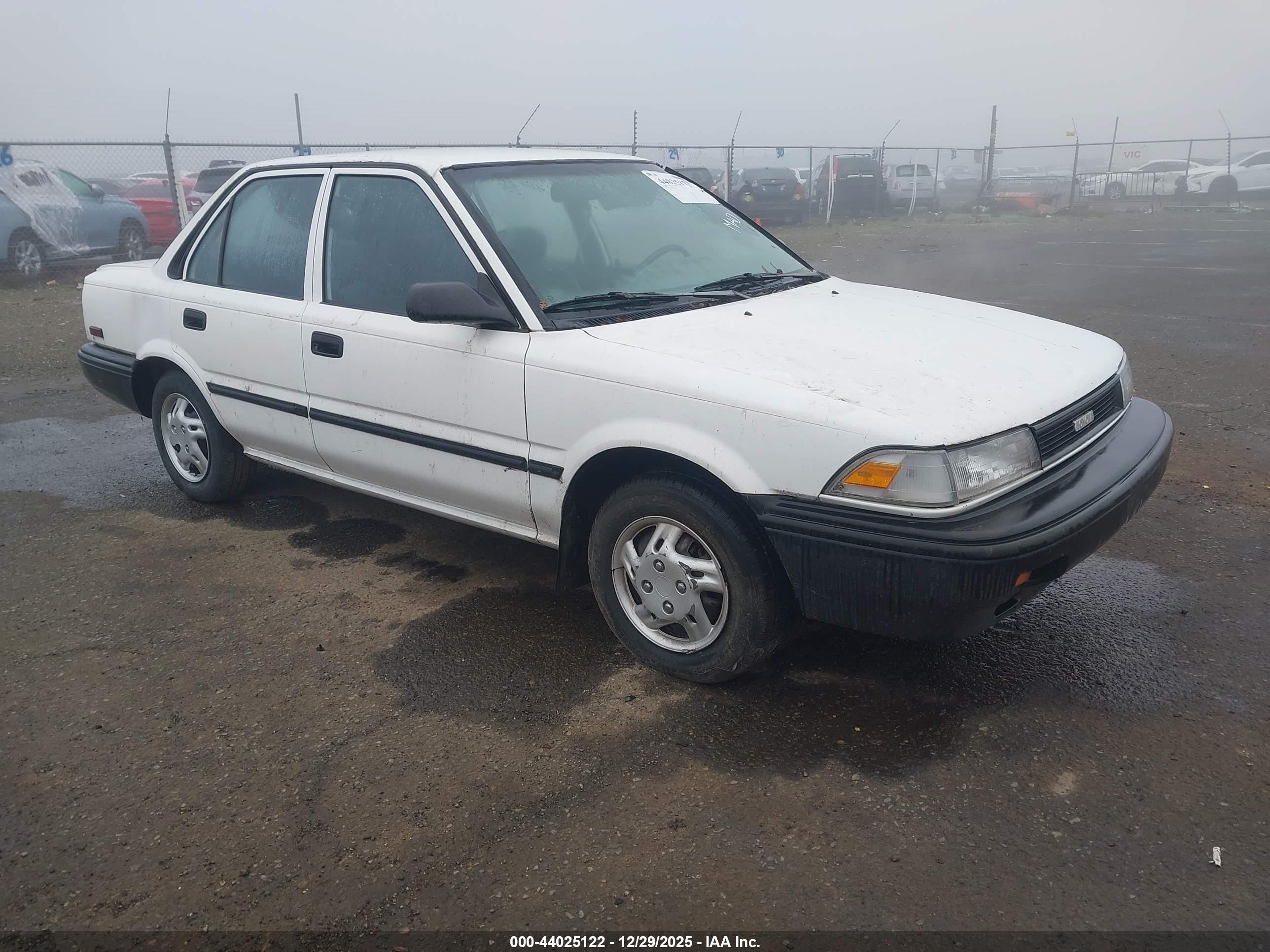 1990 Toyota Corolla, VIN 1NXAE94A3LZ094560 — Rear end