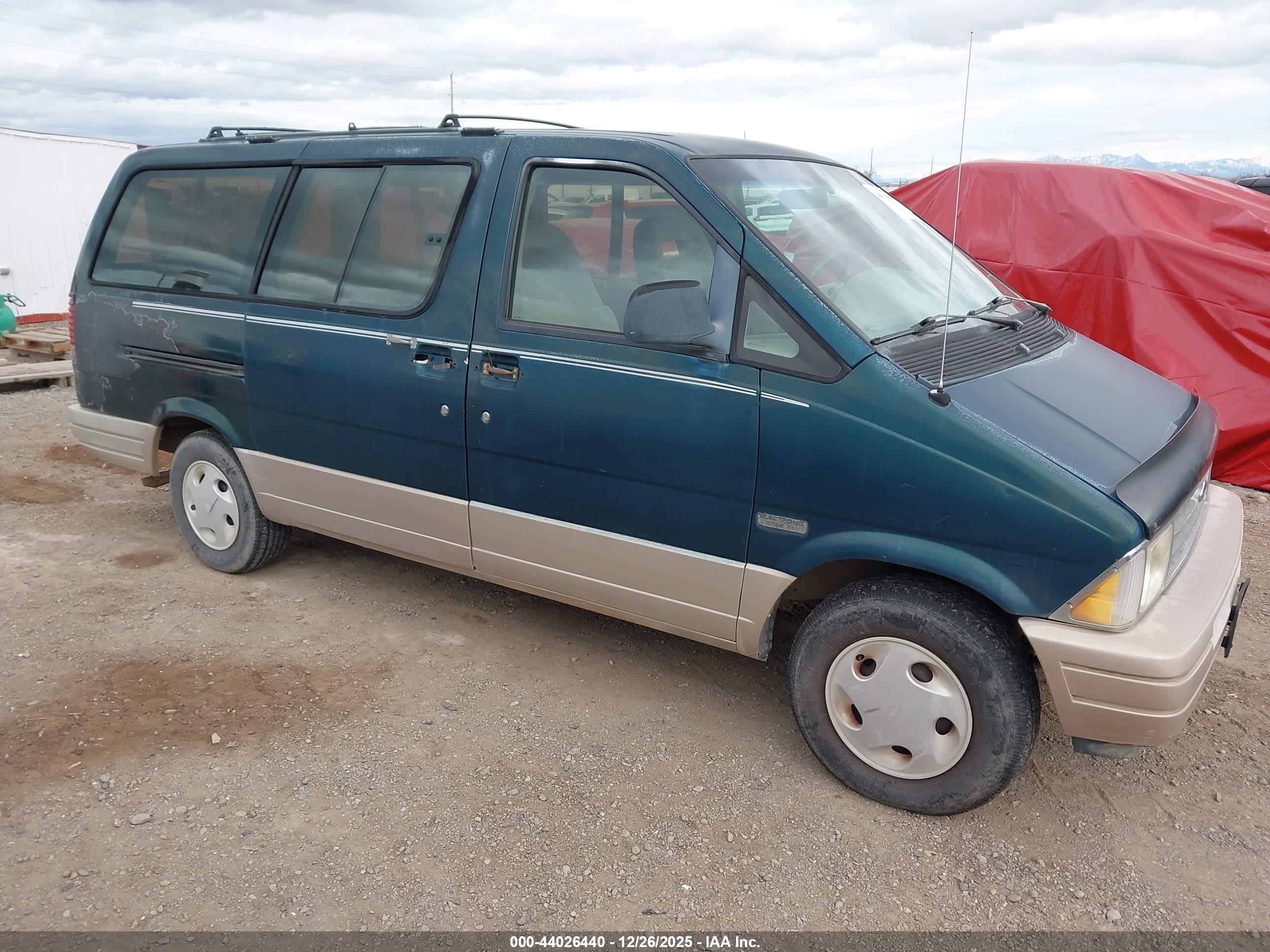 1997 Ford Aerostar XLT, VIN 1FMDA41X8VZA85136 — Side
