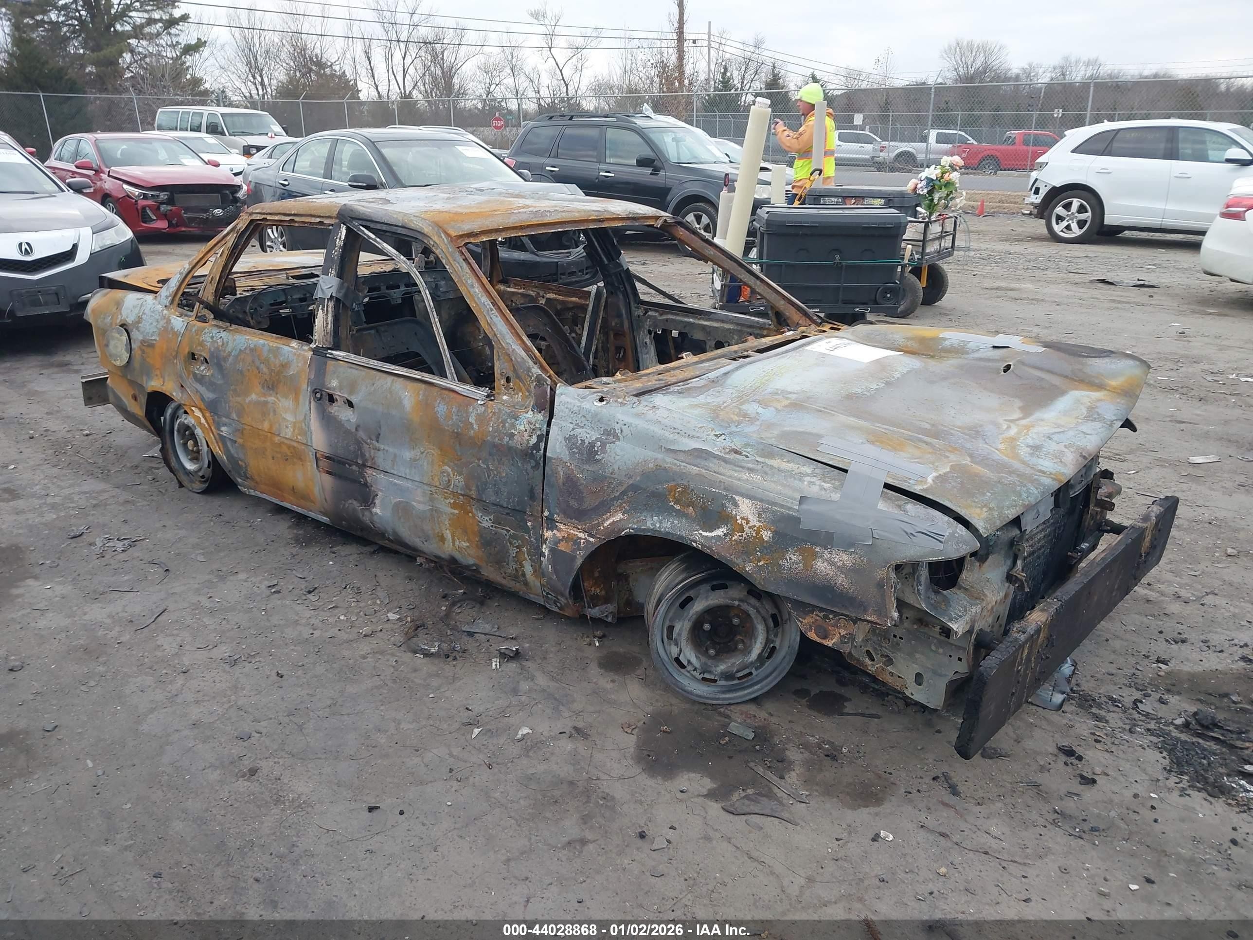 1991 Ford Tempo, VIN 1FAPP36X5MK122353 — Burn