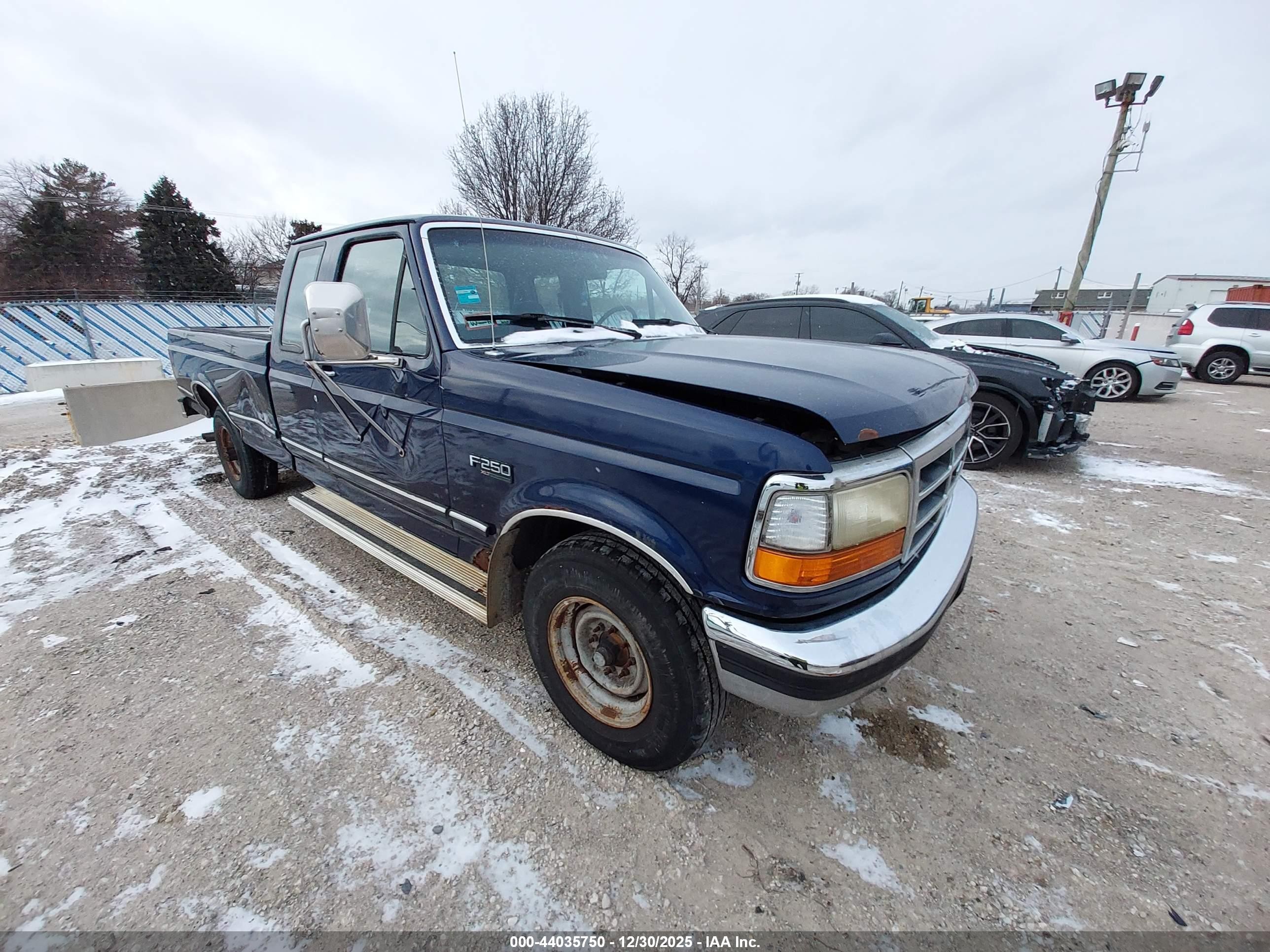 1994 Ford F-250, VIN 1FTHX25G6RKA63055 — Side