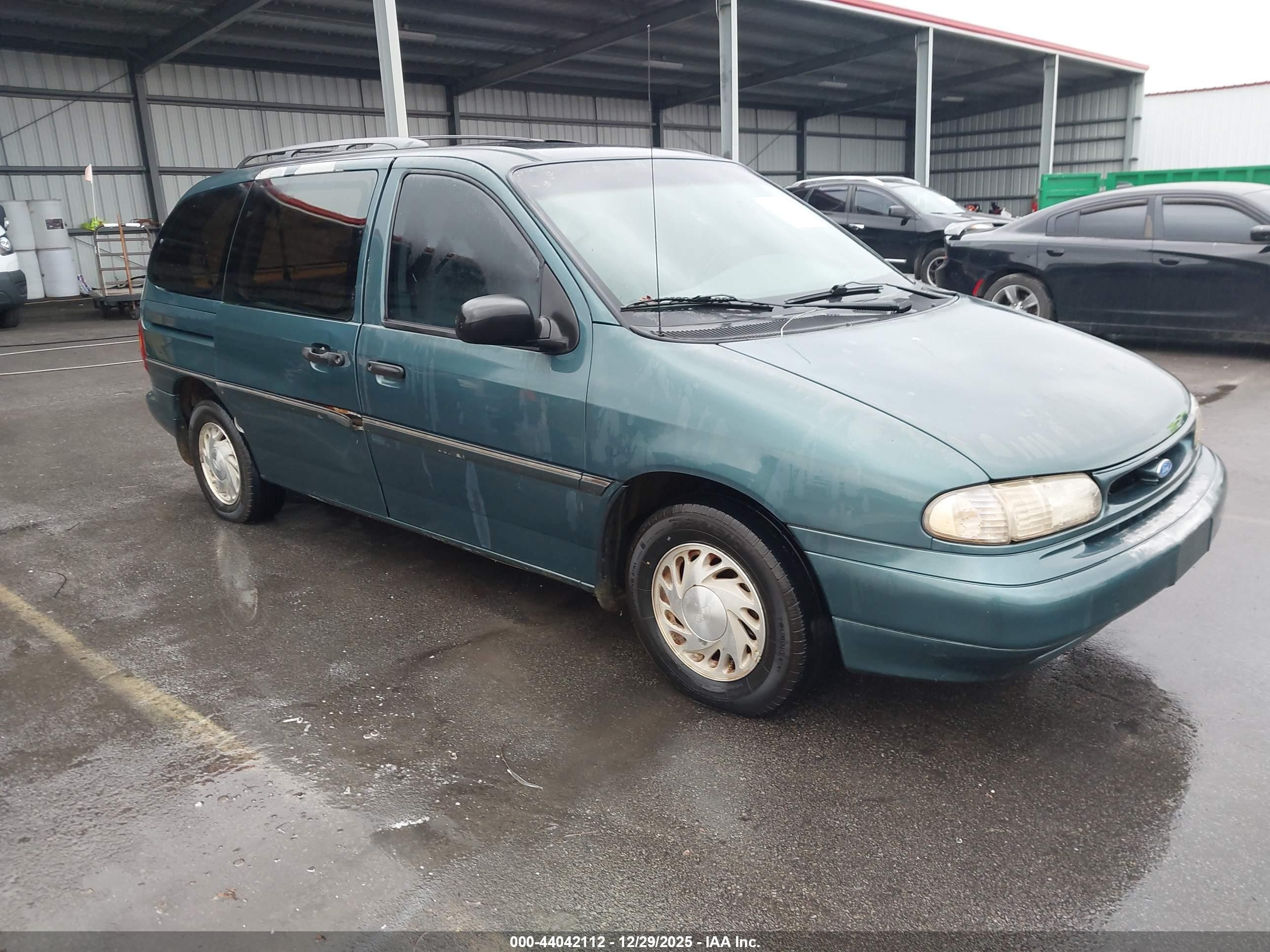 1997 Ford Windstar LX, VIN 2FMDA5142VBC80292 — Side