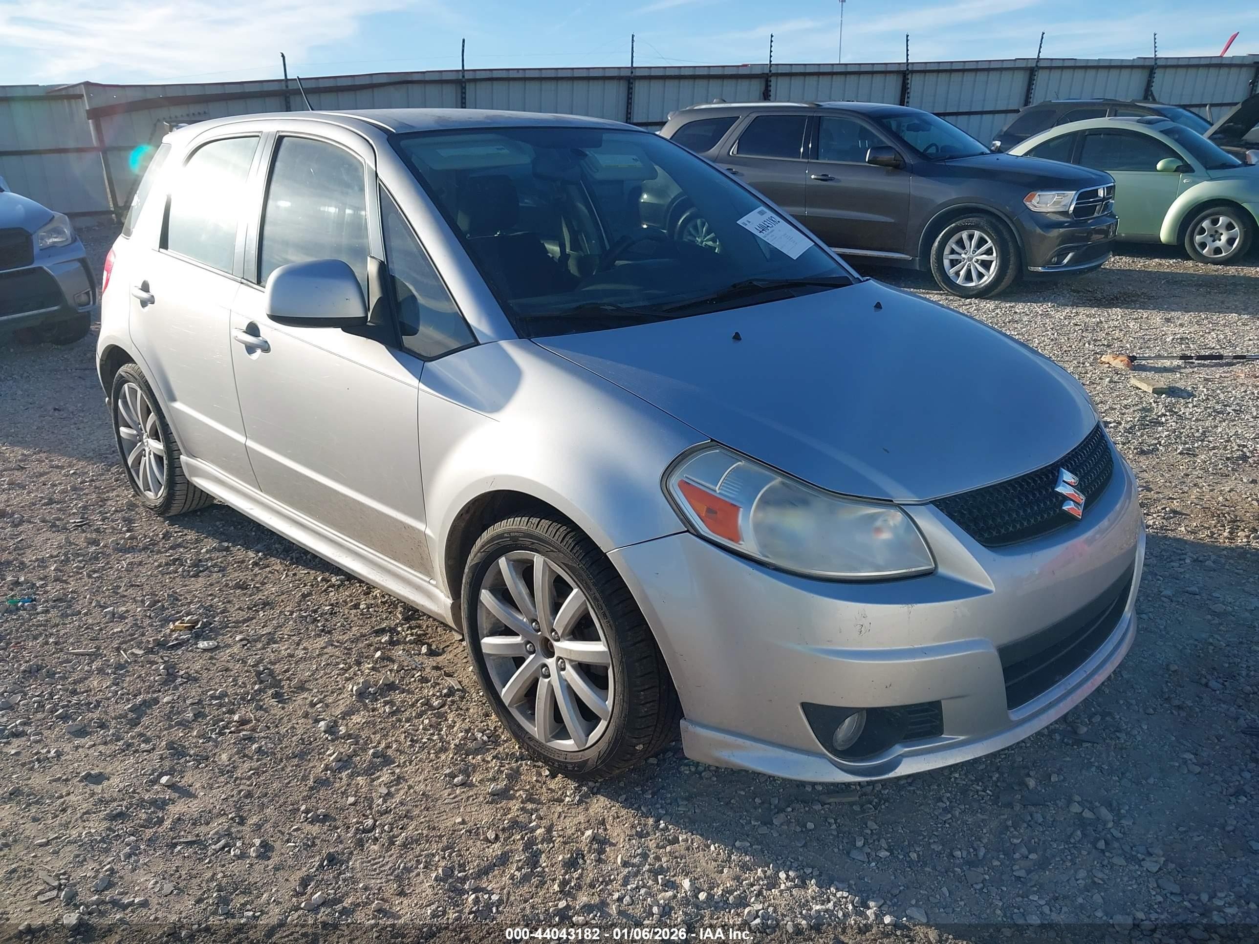 2010 Suzuki SX4 Sportback, VIN JS2YA5A96A6300172 — Бок