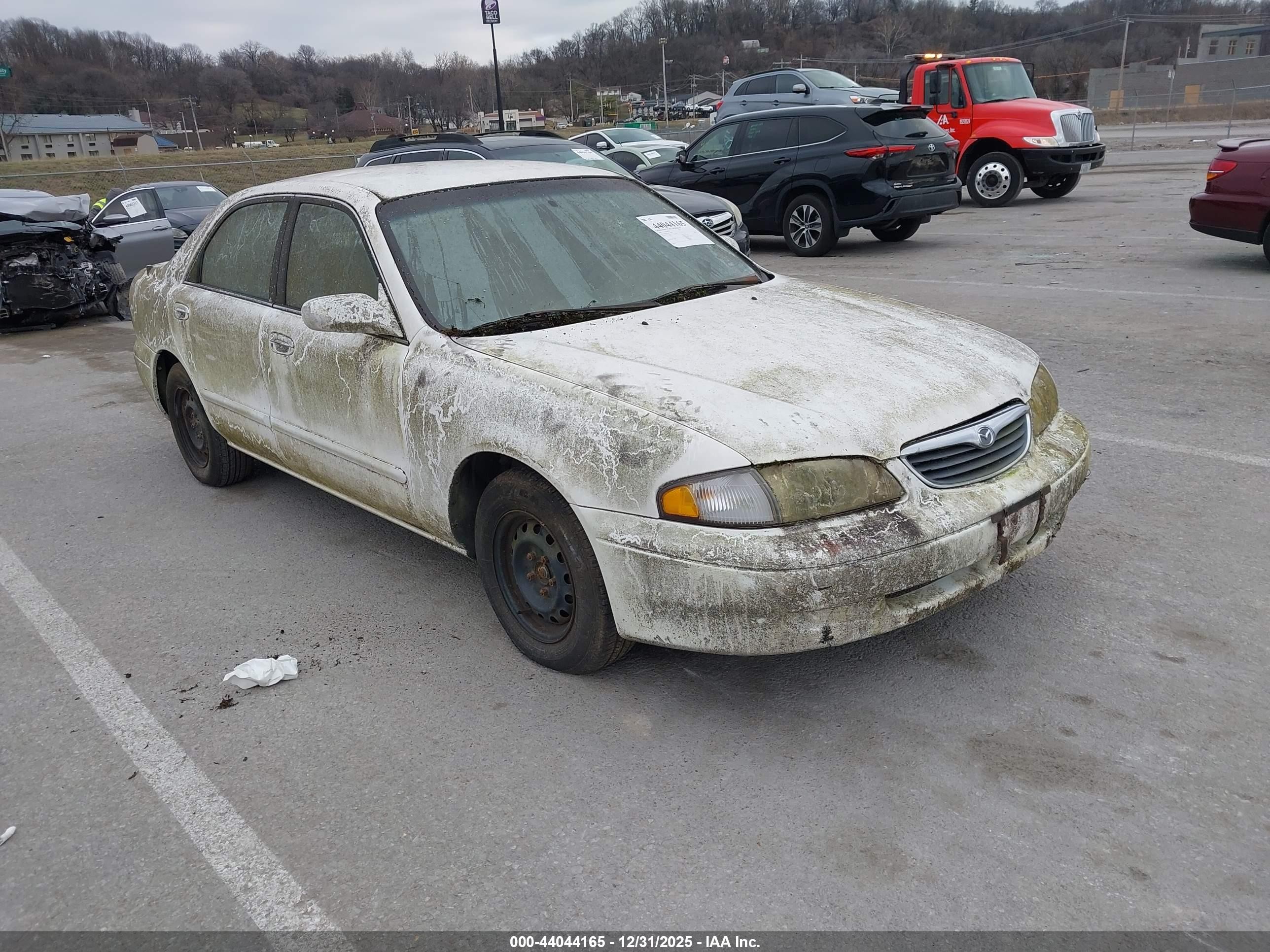 1998 Mazda 626 DX, VIN 1YVGF22C5W5778929 — Normal wear
