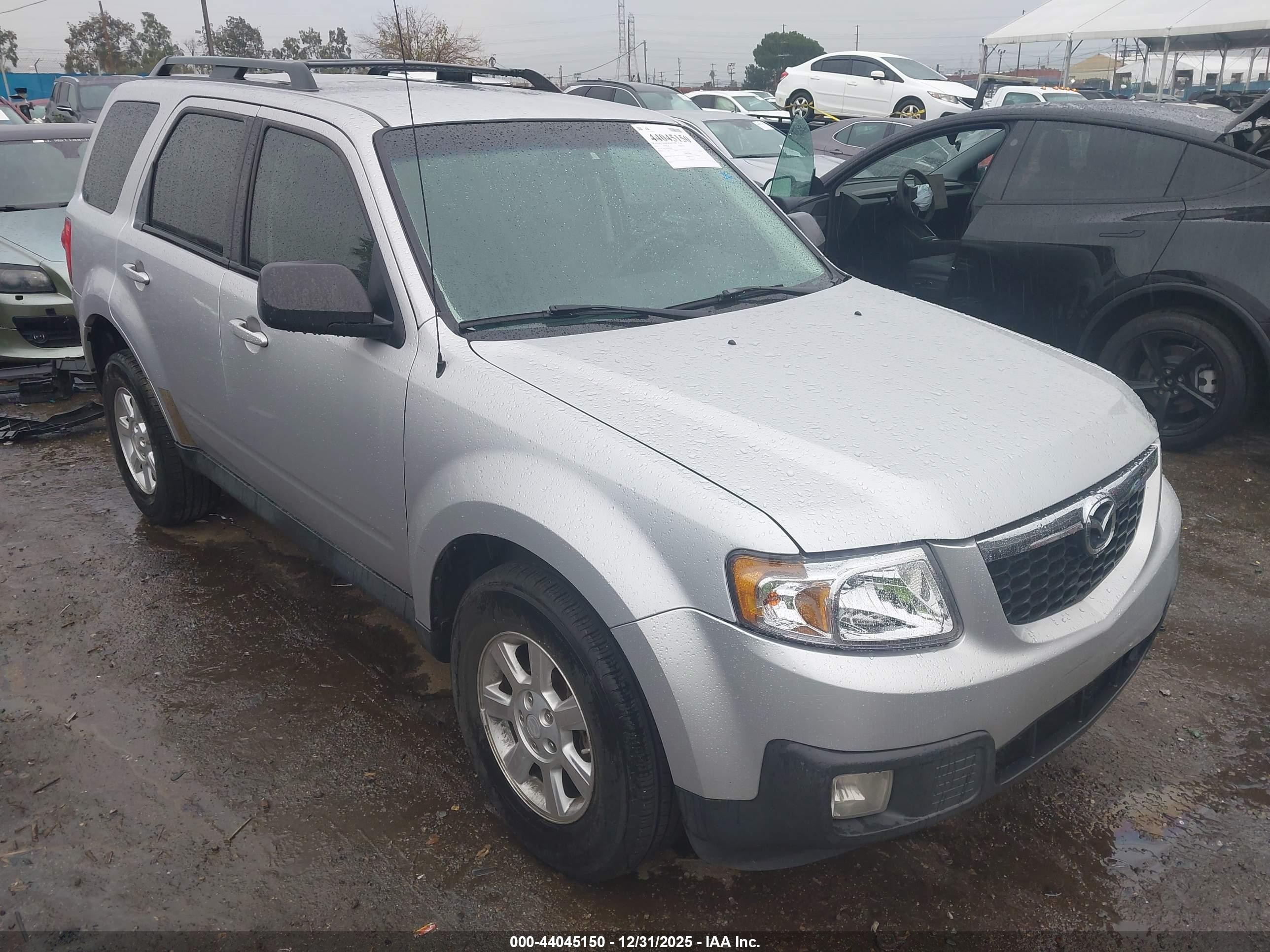 2011 Mazda Tribute Touring, VIN 4F2CY0C70BKM02400 — Rear end