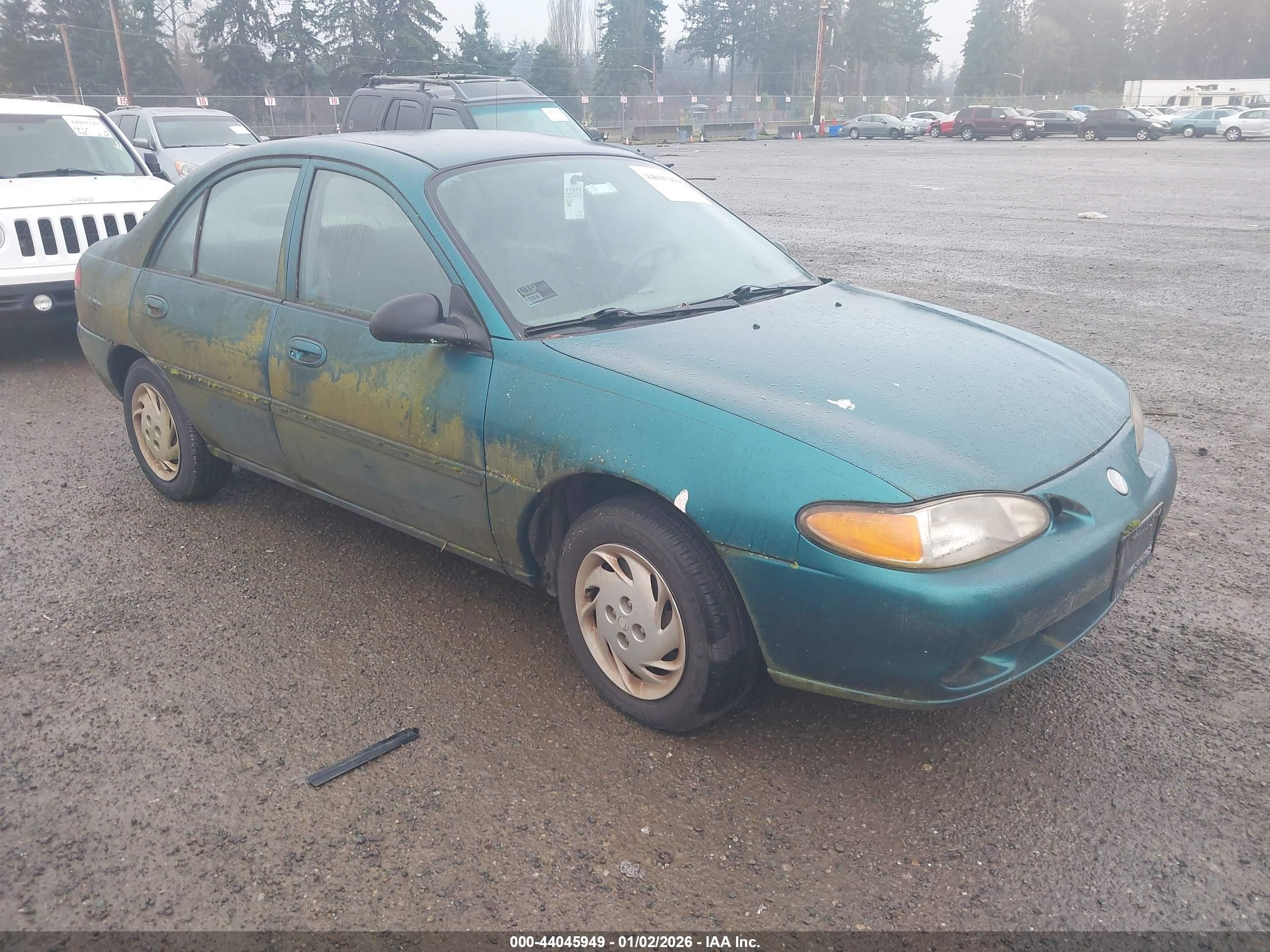 1998 Mercury Tracer LS, VIN 1MEFM13P2WW624528 — Side