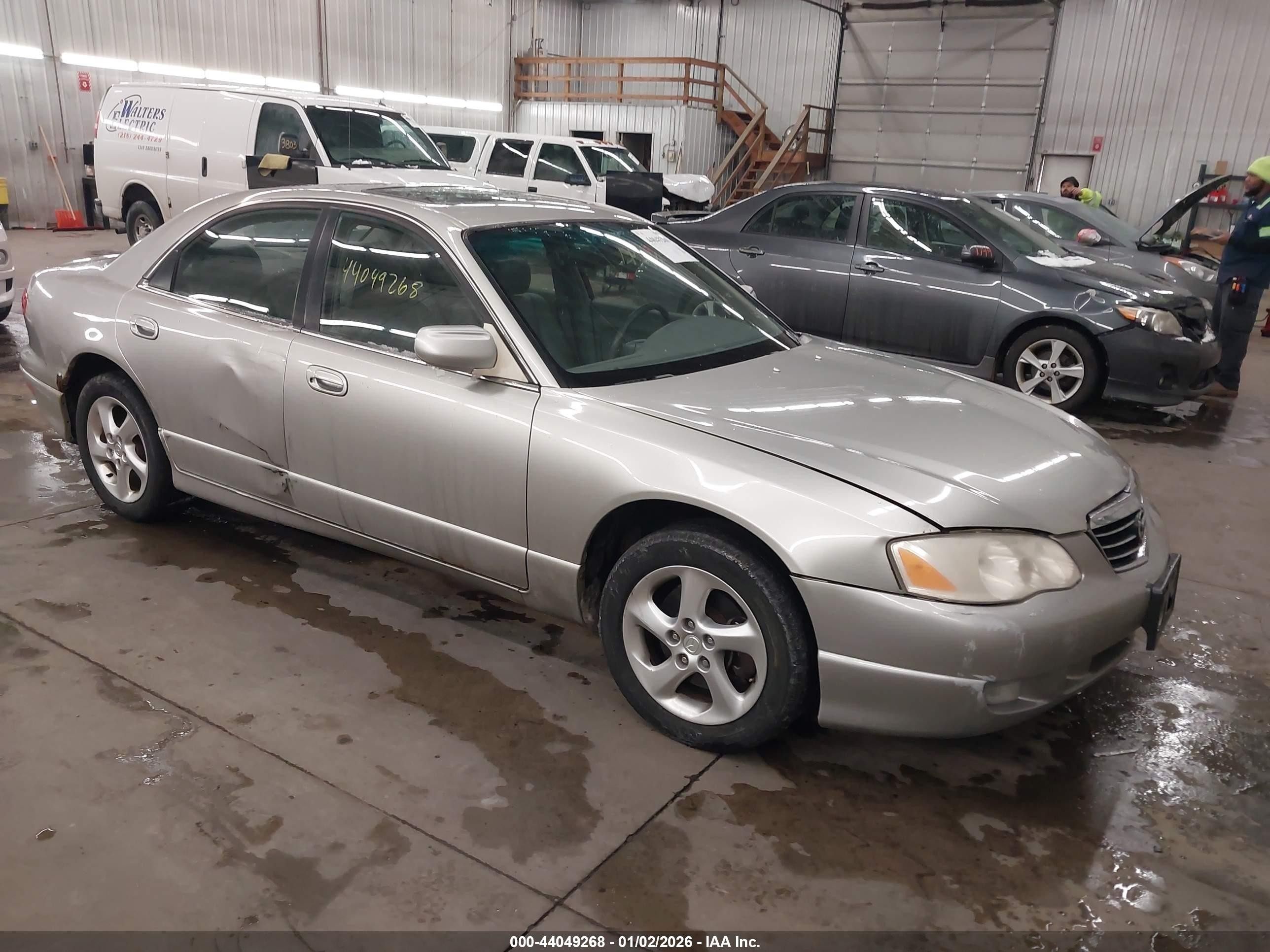 2001 Mazda Millenia, VIN JM1TA221211714235 — Normal wear