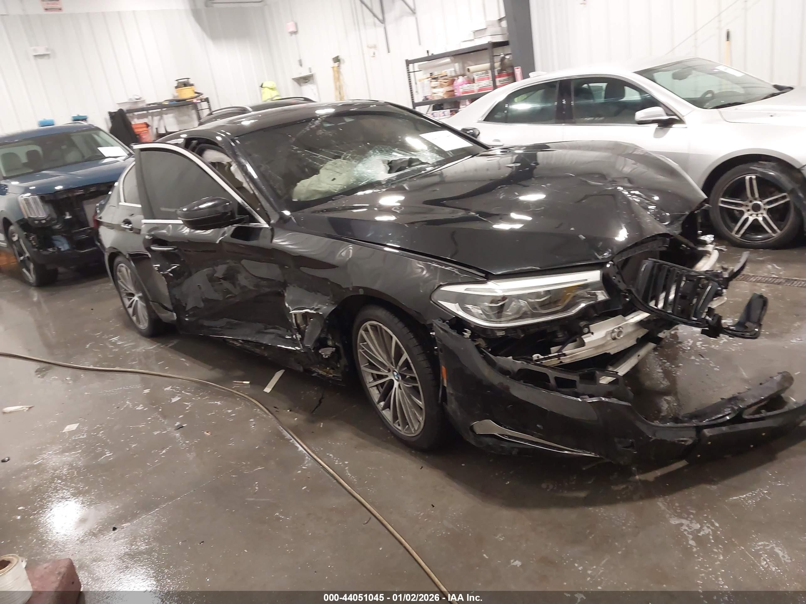 2018 BMW 5 Series 540i, VIN WBAJE5C58JWA93617 — Side
