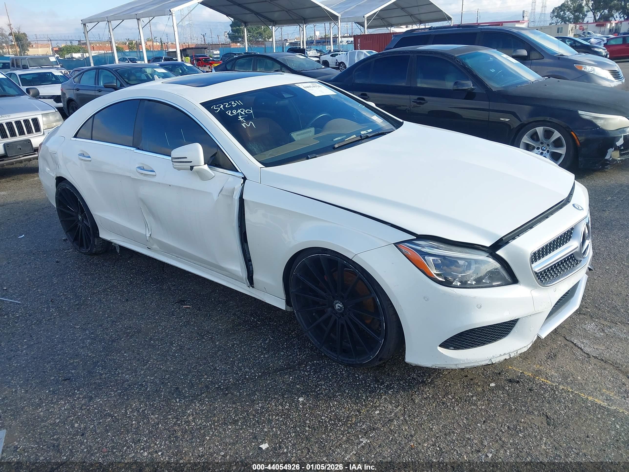 2015 Mercedes-Benz CLS 400, VIN WDDLJ6FB2FA155454 — Side