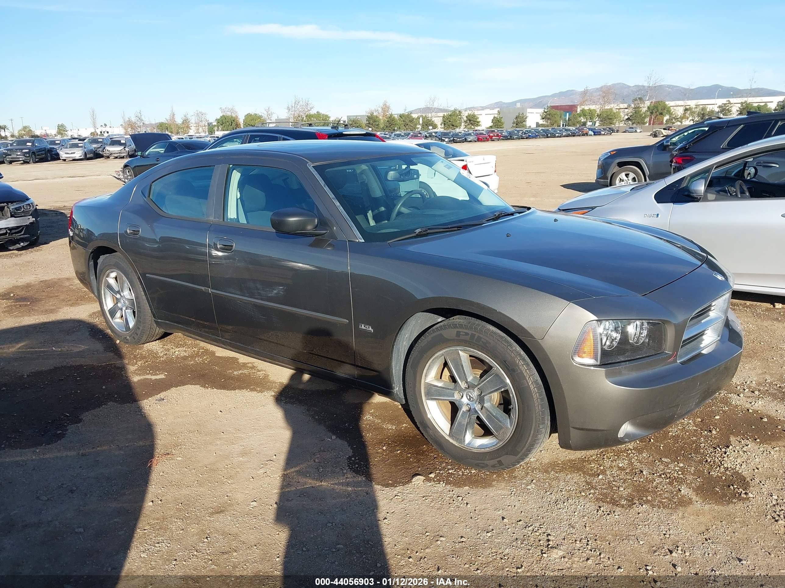 2009 Dodge Charger, VIN 2B3LA33V19H526005 — Side