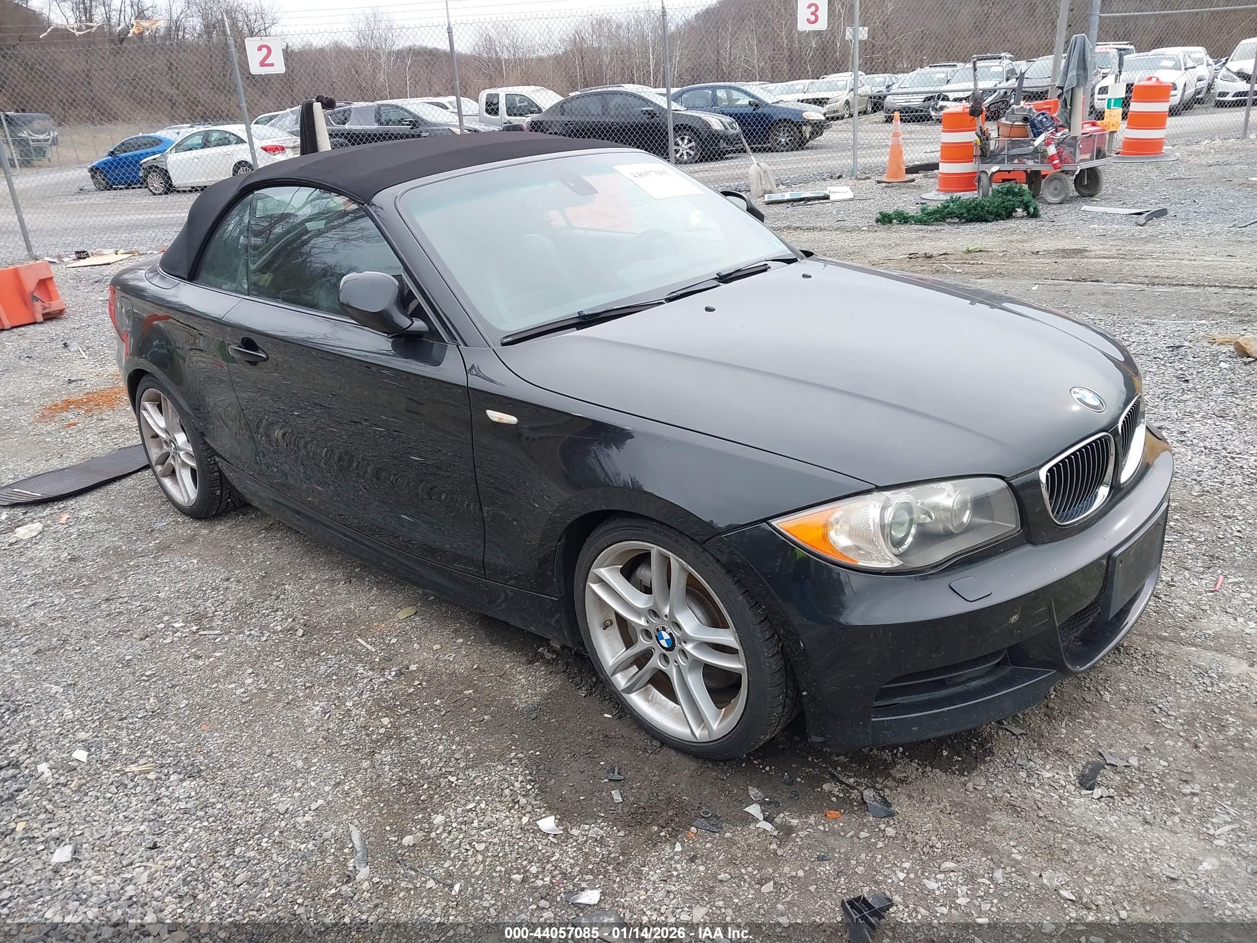 2011 BMW 1 Series 135i, VIN WBAUN7C5XBVM25246 — Rear end