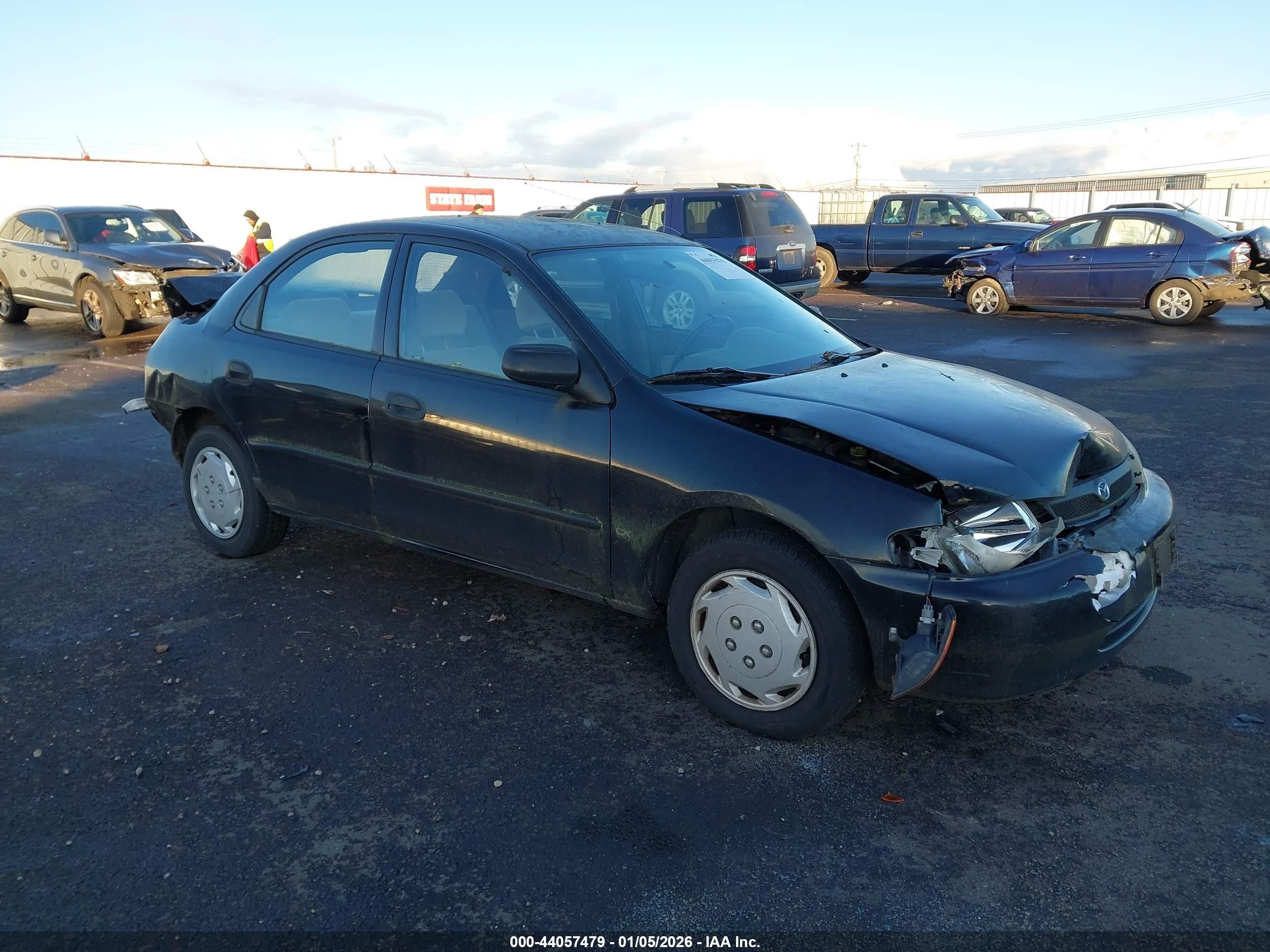 1998 Mazda Protege DX, VIN JM1BC1414W0172873 — Rear end