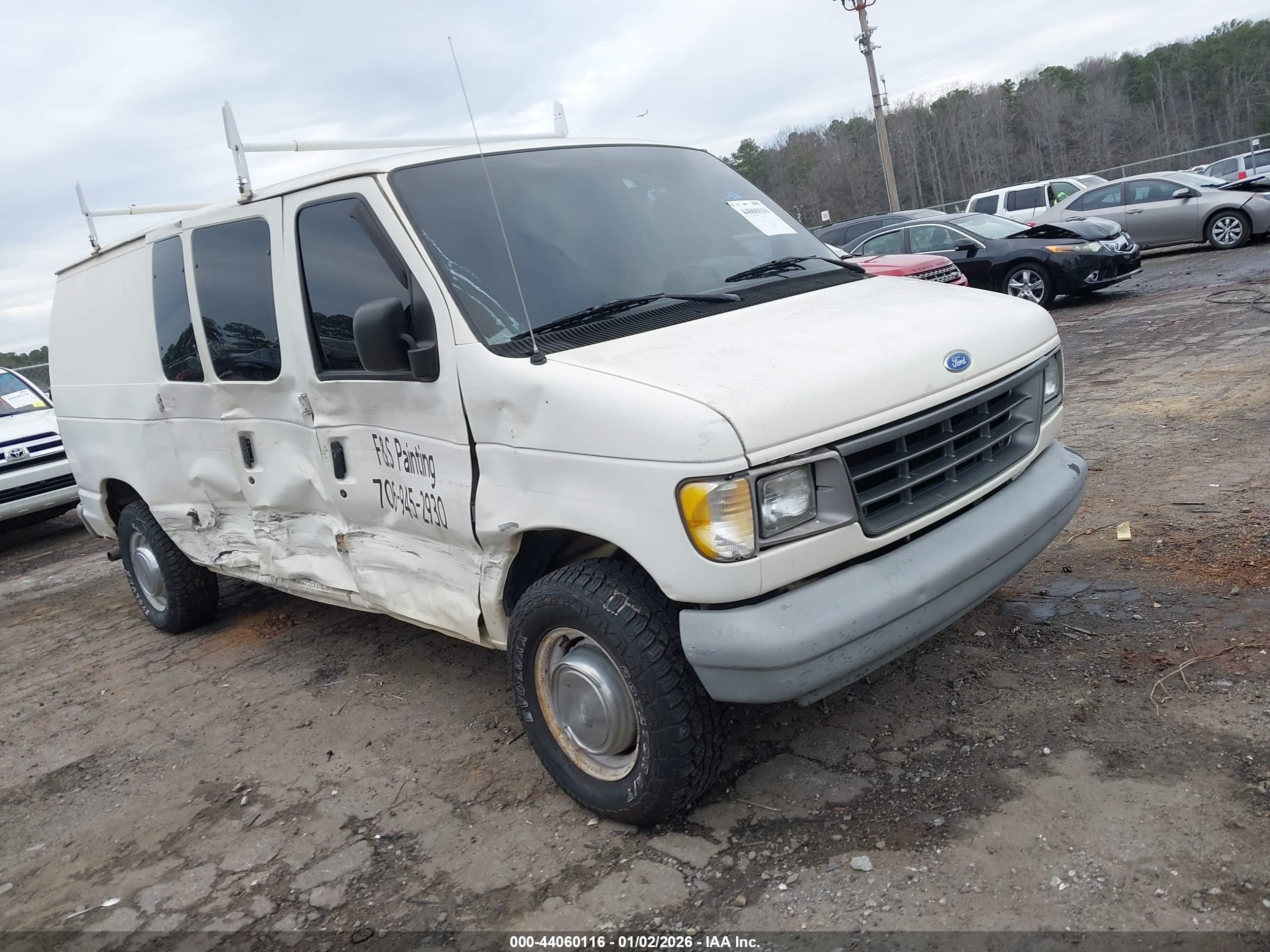 1996 Ford Econoline Cargo, VIN 1FTFE24H3THA01785 — Side