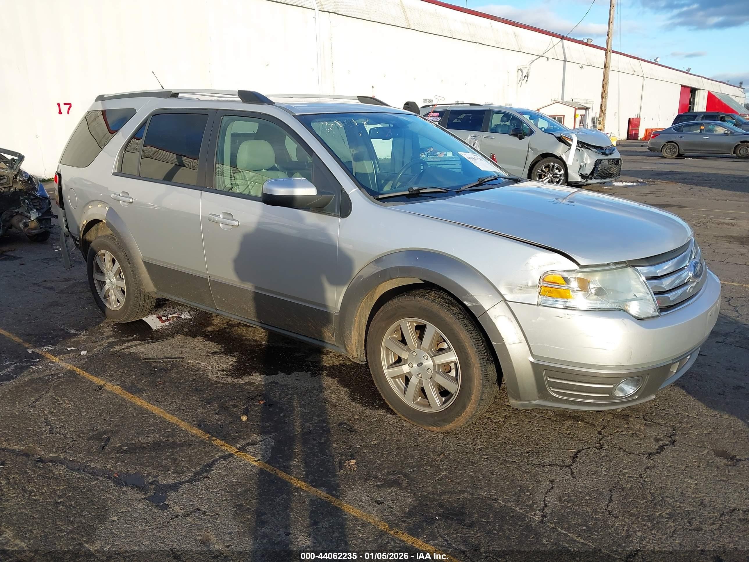 2009 Ford Taurus X SEL, VIN 1FMDK02W49GA06316 — Rear end