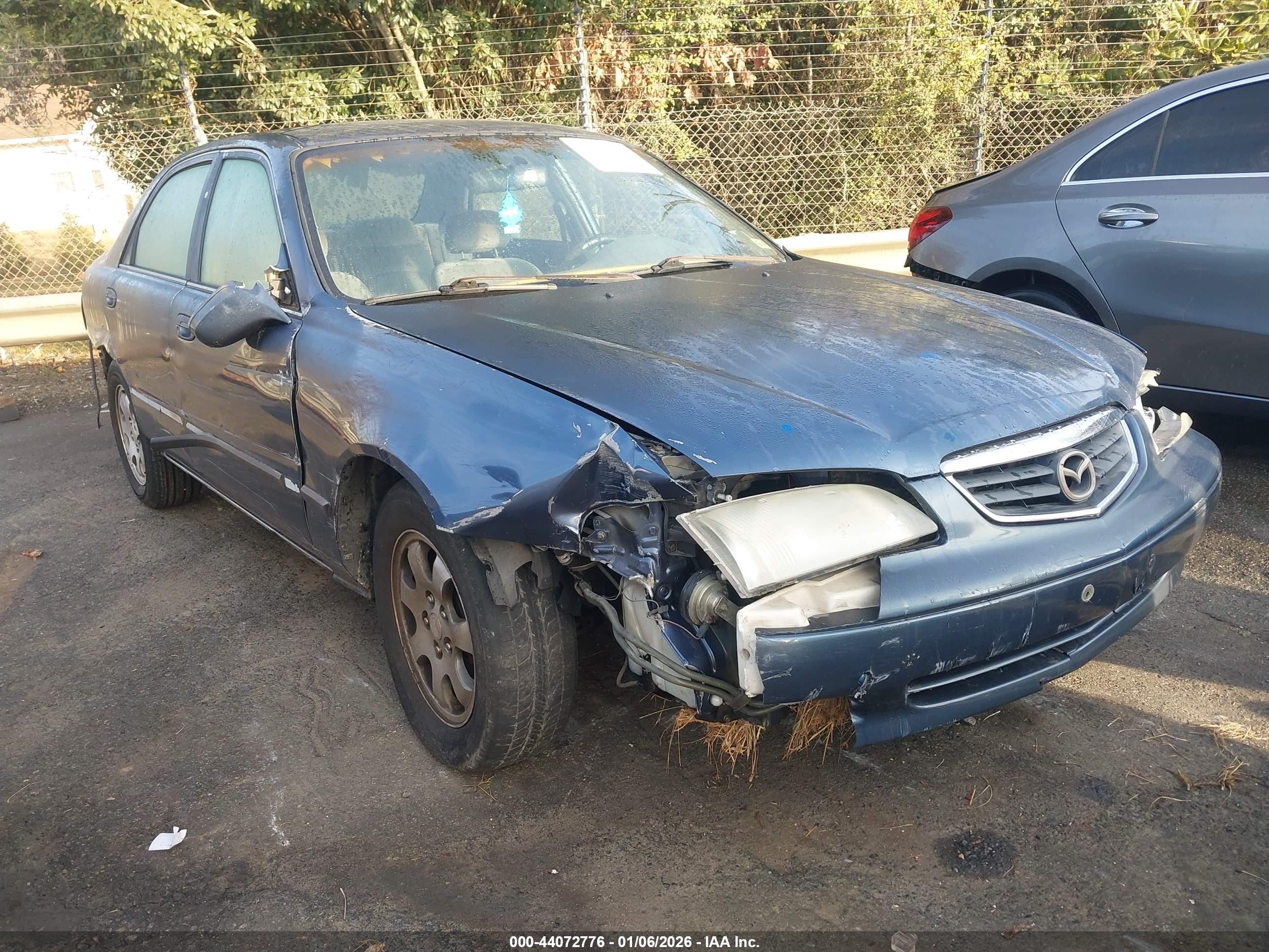 2002 Mazda 626 LX, VIN 1YVGF22C025282849 — All over