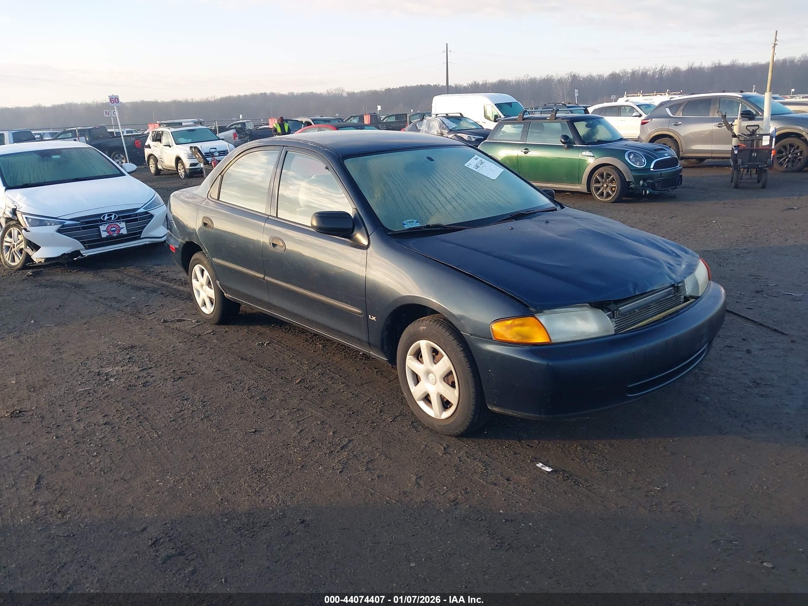 1998 Mazda Protege DX, VIN JM1BC1419W0205477 — Front end