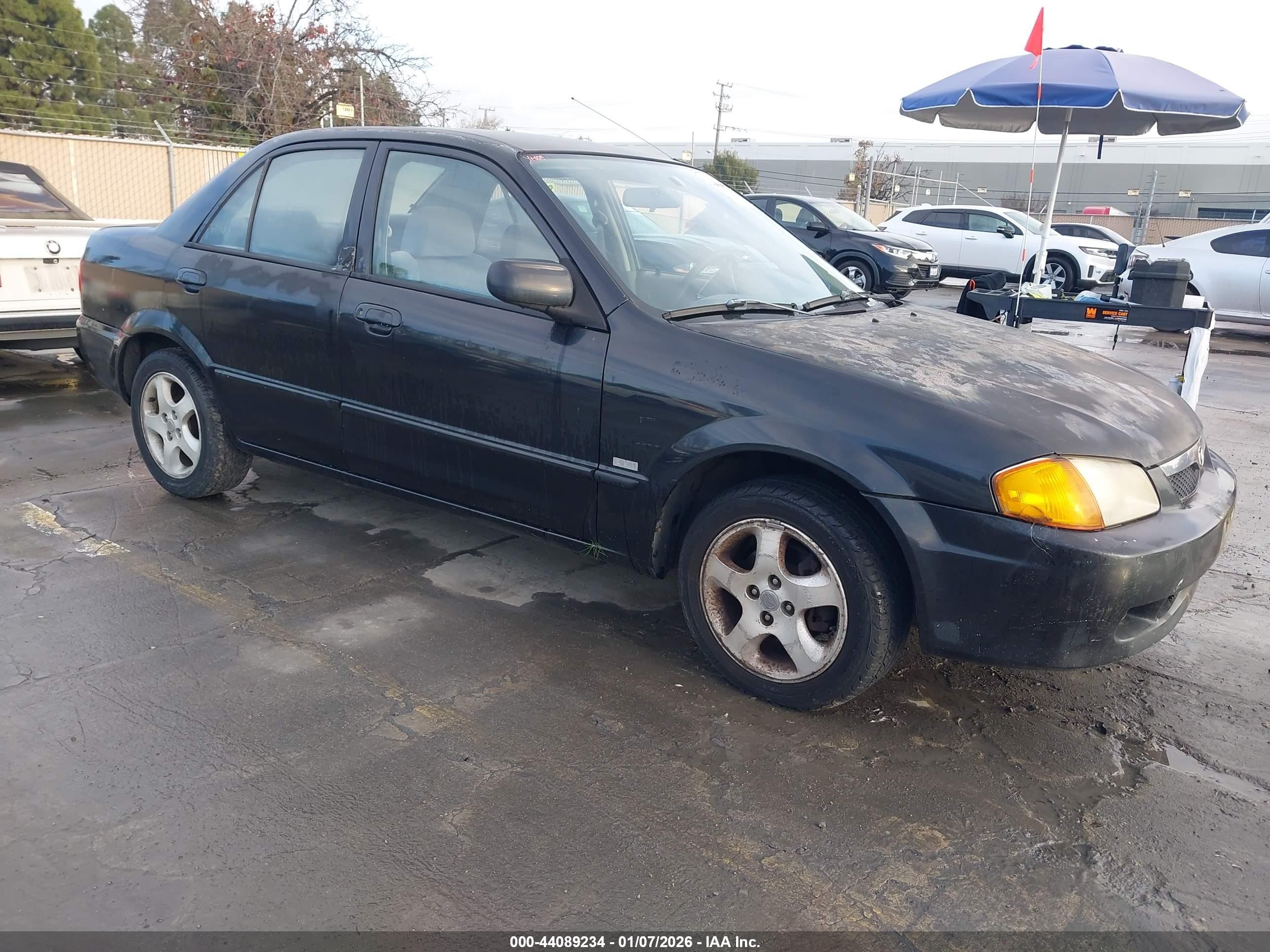 1999 Mazda Protege ES, VIN JM1BJ2215X0138912 — Механическое