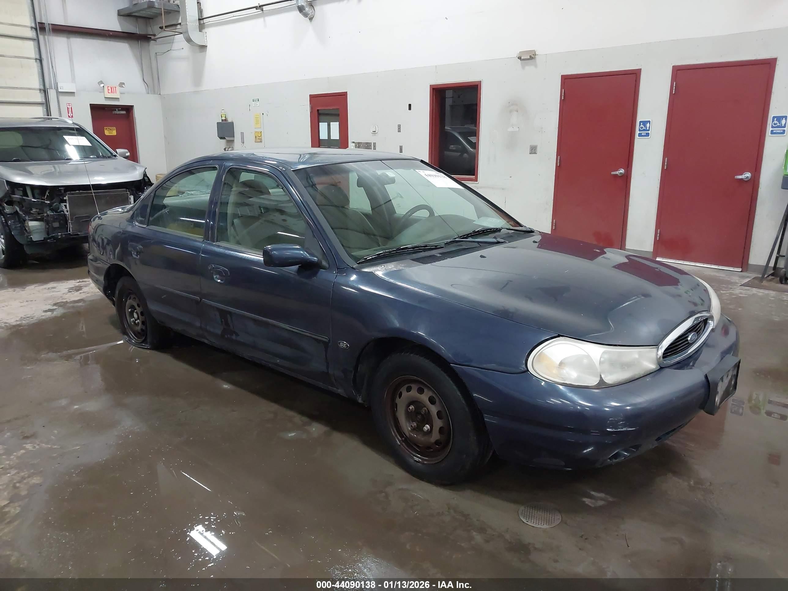 1999 Ford Contour SE Fleet, VIN 1FAFP66L7XK197053 — Rear end