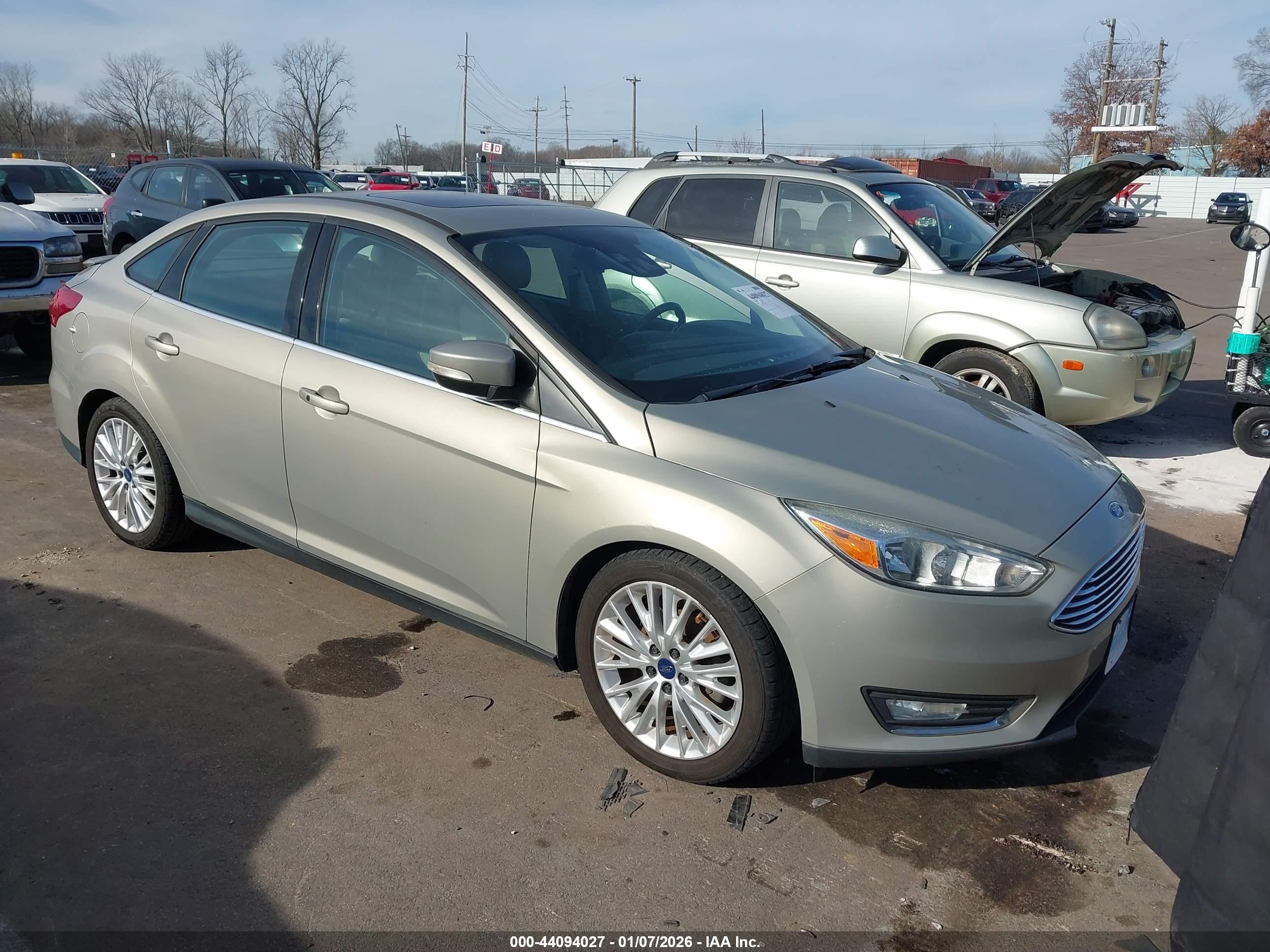 2015 Ford Focus Titanium, VIN 1FADP3J23FL373450 — Rear end