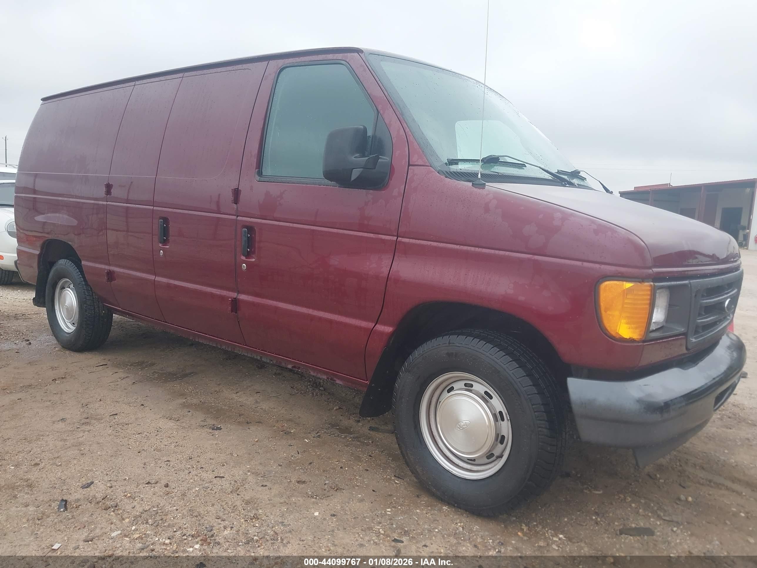 2003 Ford E-150, VIN 1FTRE14L73HB93837 — Rear end
