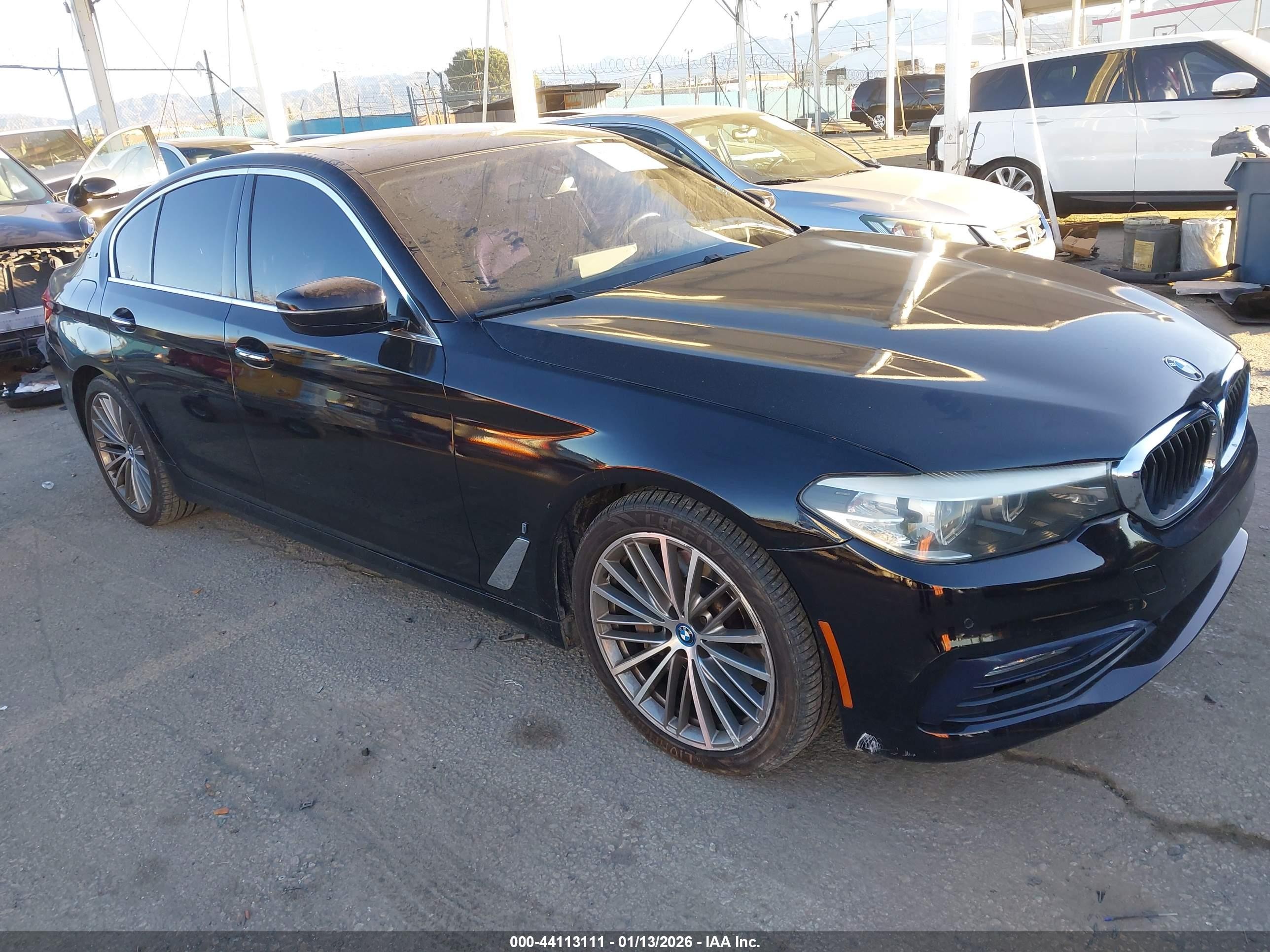 2018 BMW 5 Series 530e, VIN WBAJA9C52JB252347 — Side