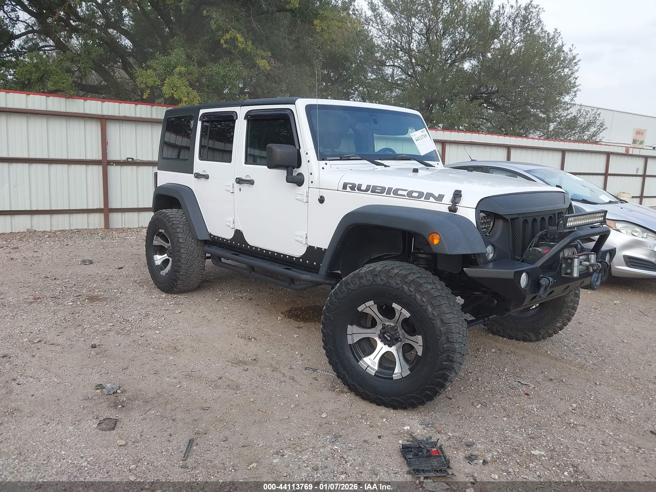 2011 Jeep Wrangler Unlimited Rubicon, VIN 1J4BA6H10BL536027 — Фото с аукциона