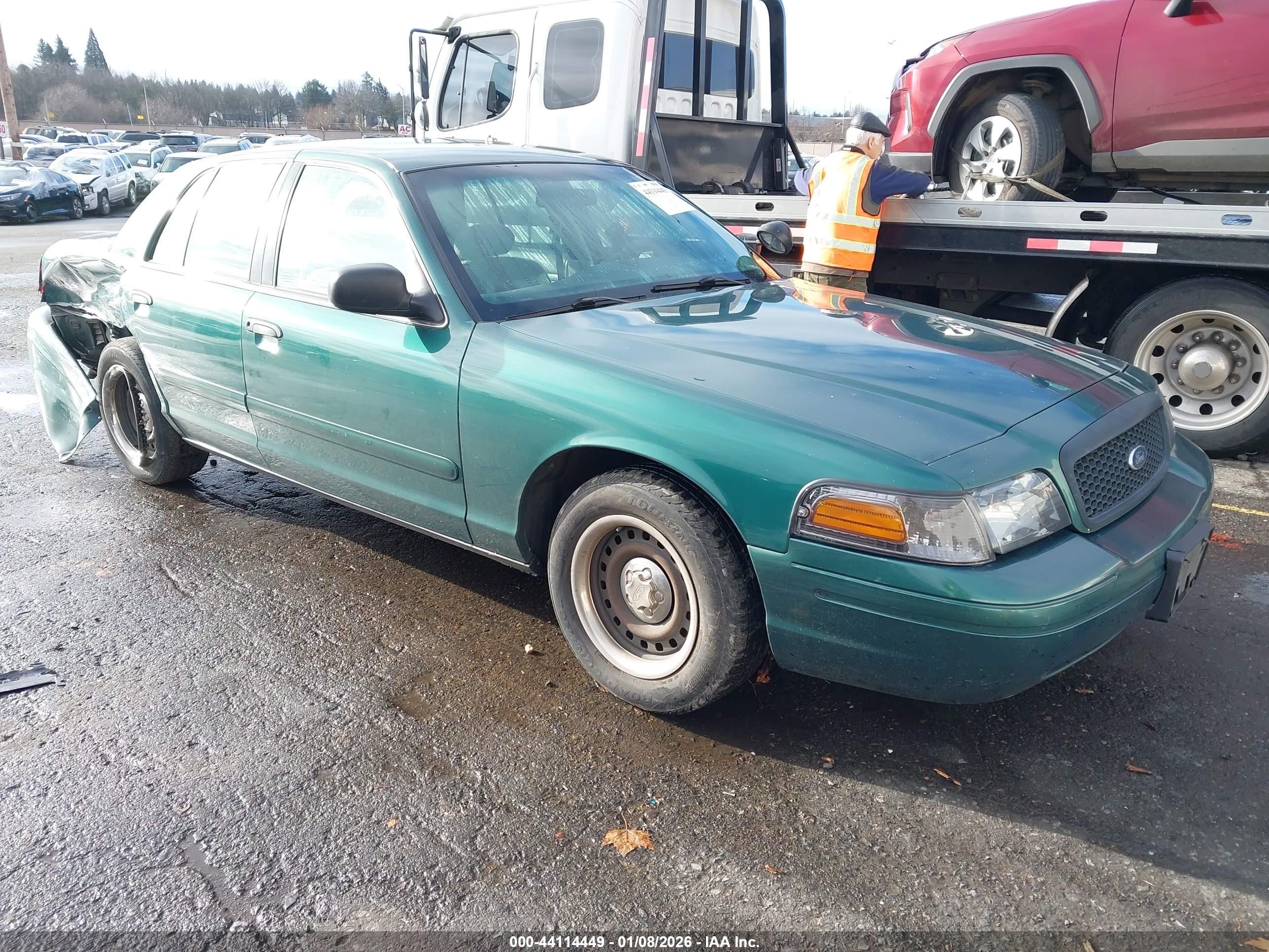 2001 Ford Crown Victoria Police Interceptor, VIN 2FAFP71W61X190896 — Side