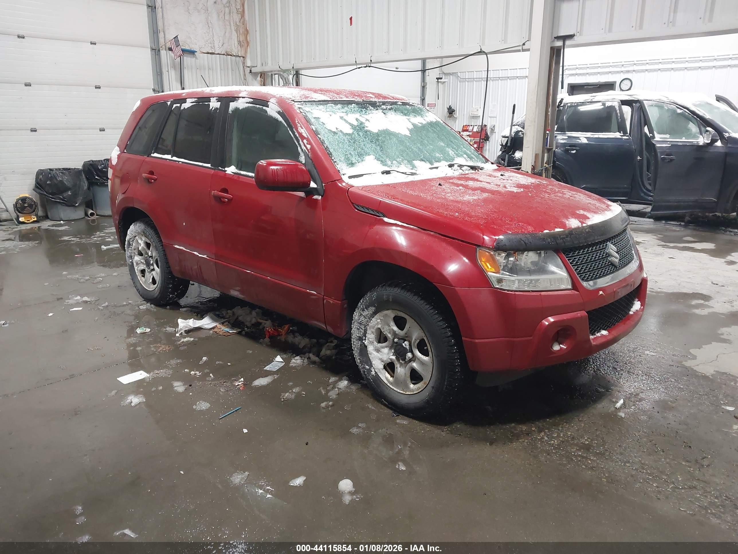 2012 Suzuki Grand Vitara Premium, VIN JS3TD0D27C4101127 — Бок
