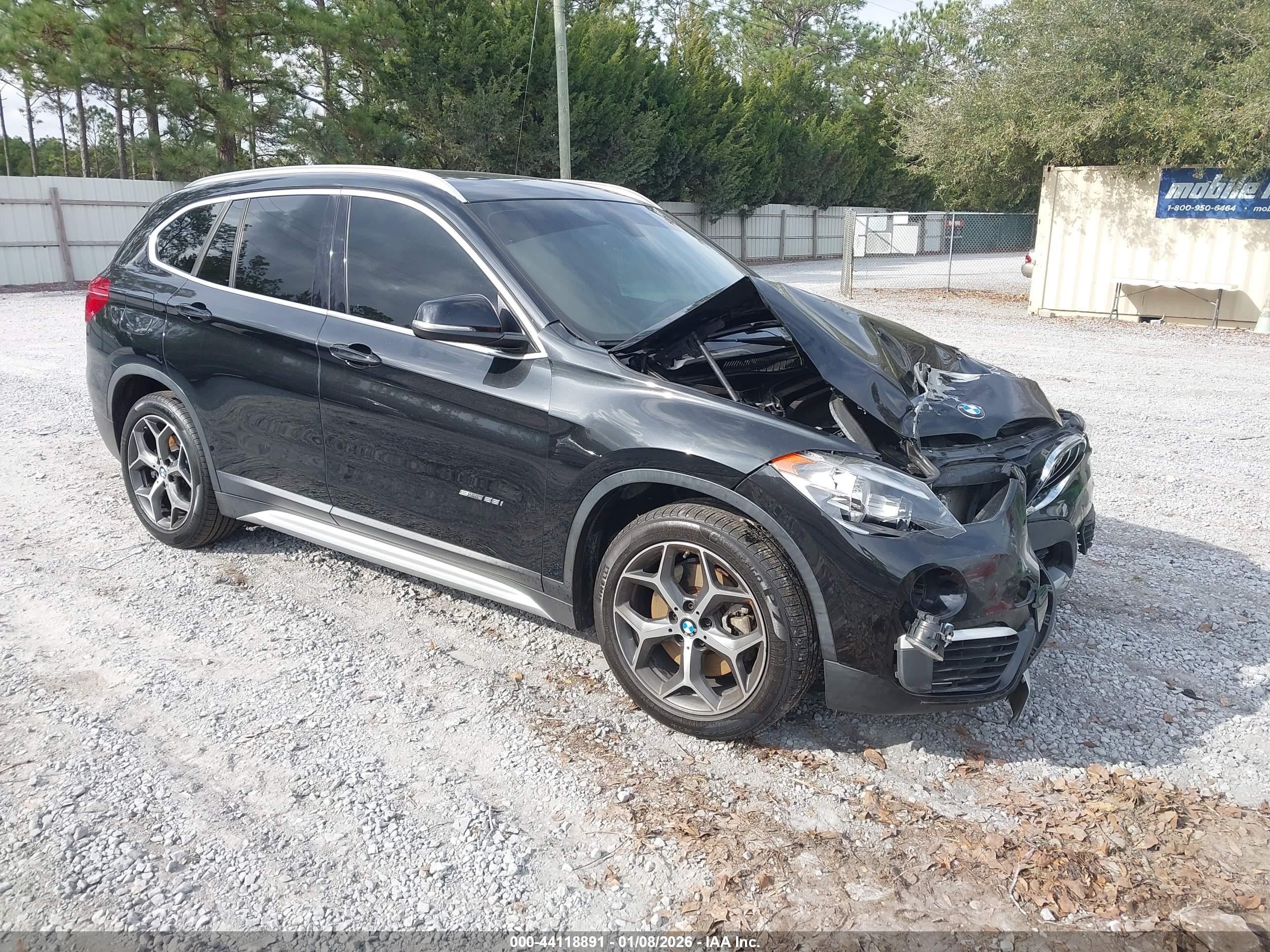 2018 BMW X1 sDrive28i, VIN WBXHU7C38J5H45904 — Front end