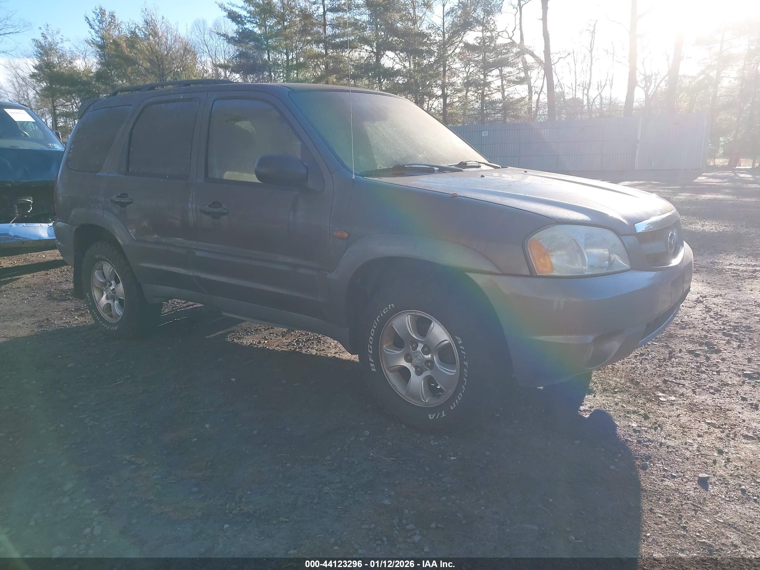 2002 Mazda Tribute LX, VIN 4F2YU081X2KM22451 — Rear end