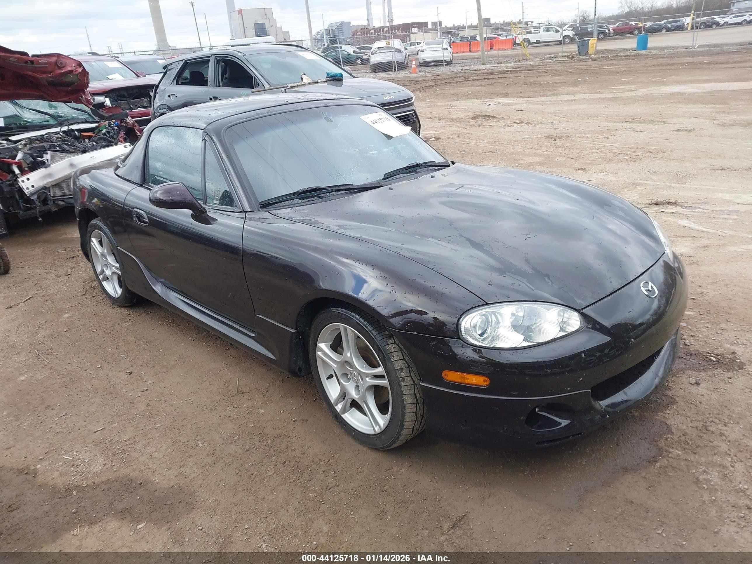 2004 Mazda MX-5 Miata LS, VIN JM1NB353840403704 — Rear end