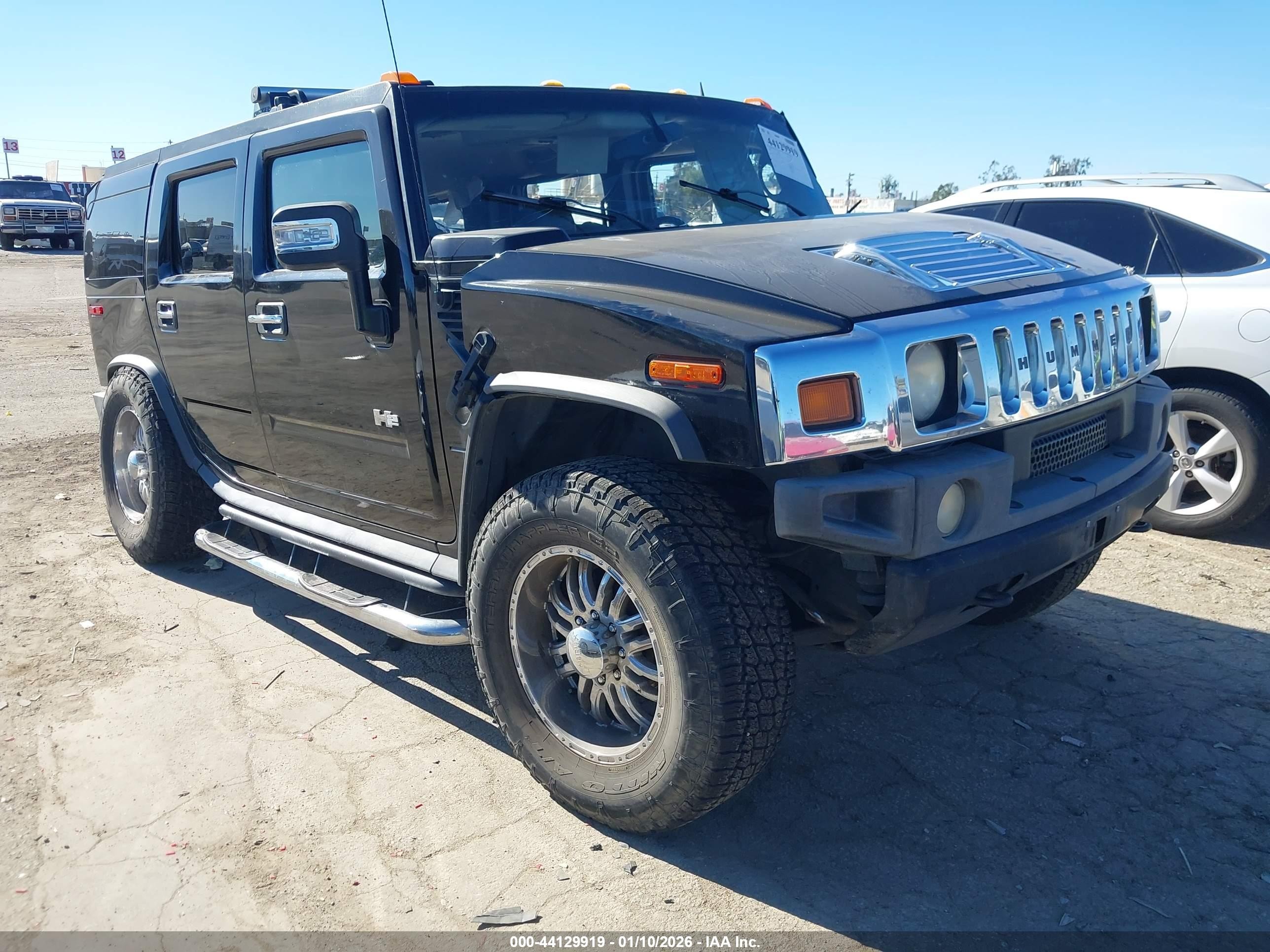2006 Hummer H2, VIN 5GRGN23U96H100584 — Rollover