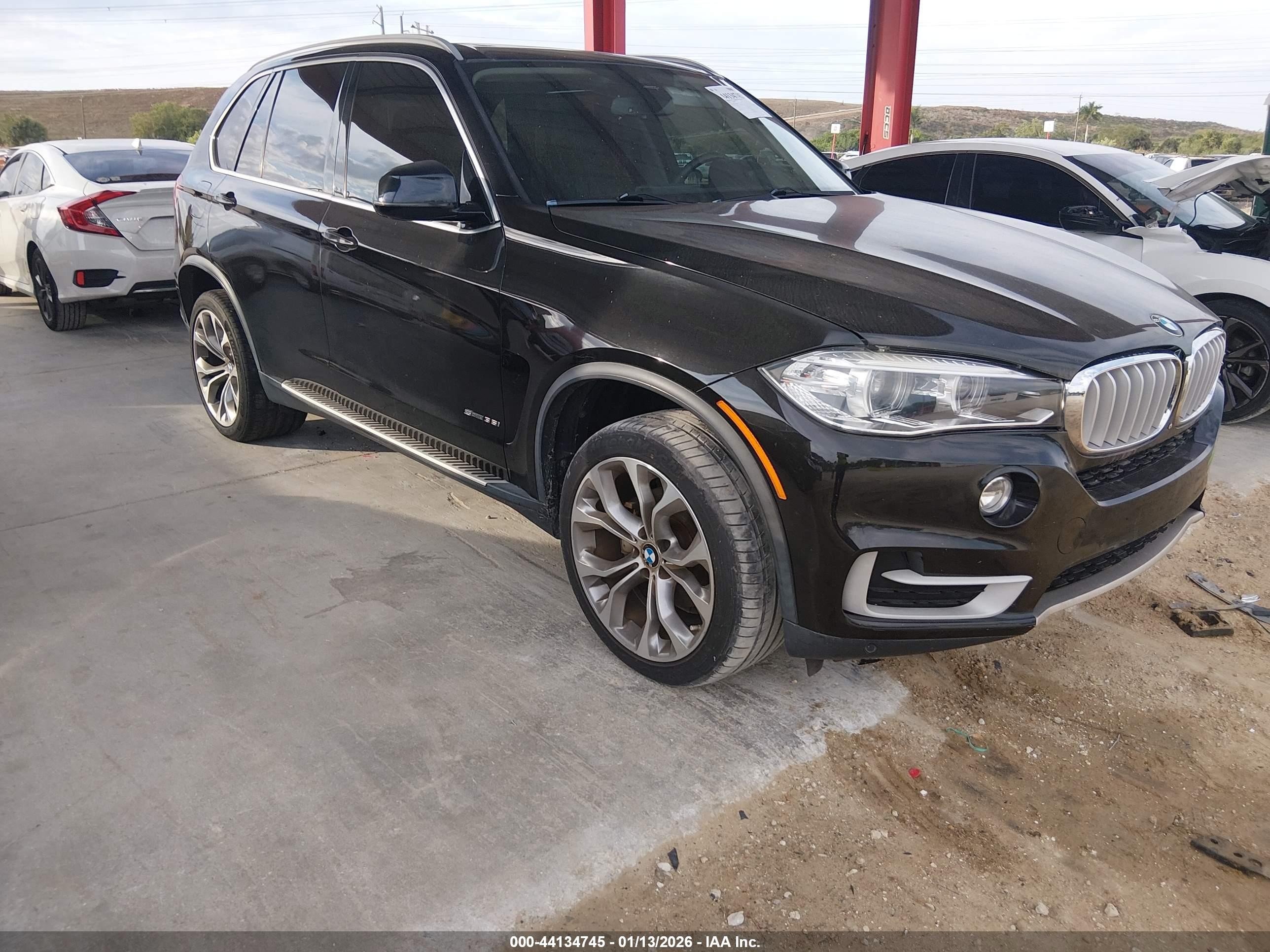 2014 BMW X5 sDrive35i, VIN 5UXKR2C50E0C00208 — Auction photo