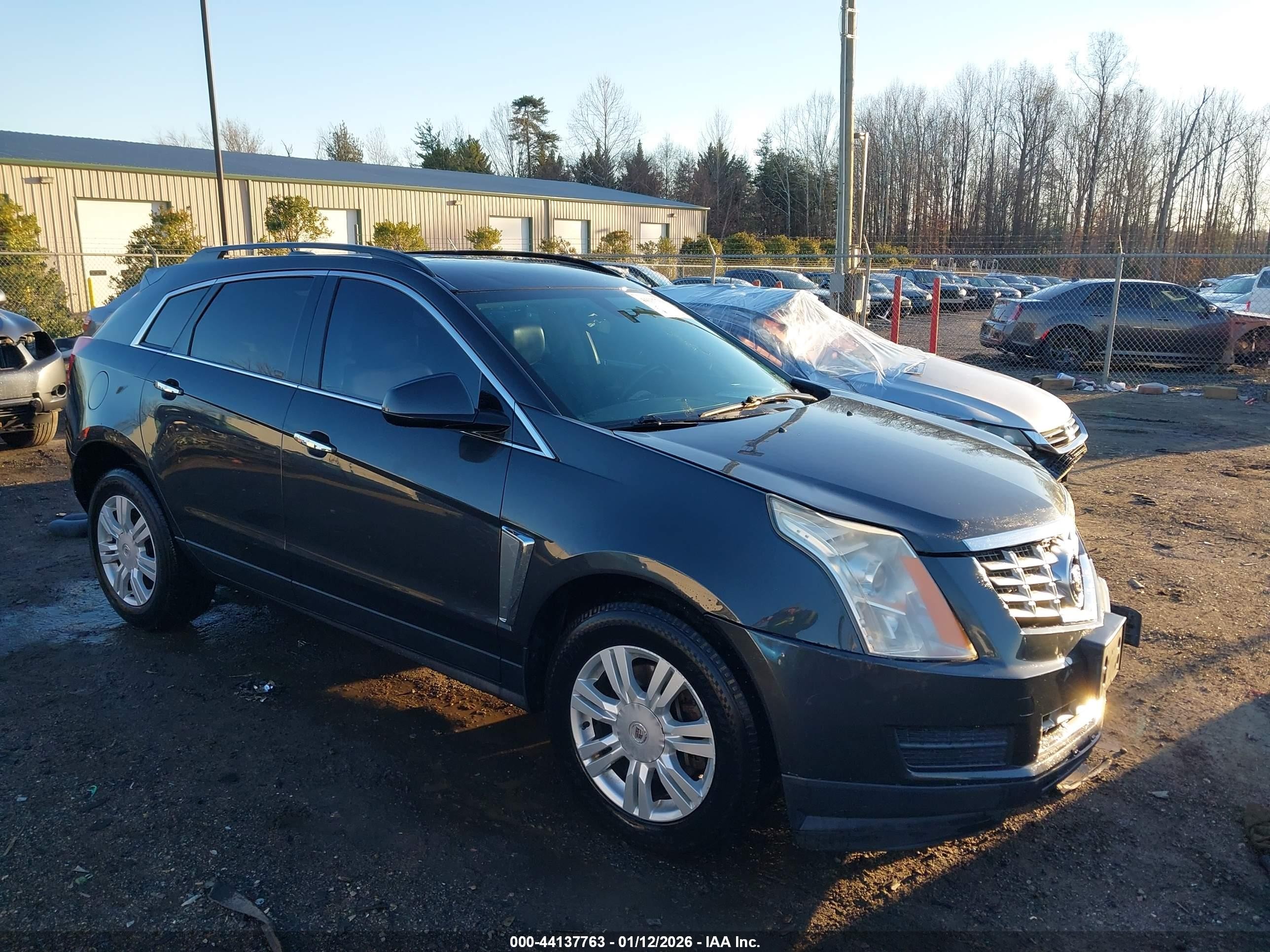 2016 Cadillac SRX, VIN 3GYFNAE31GS514456 — Front end