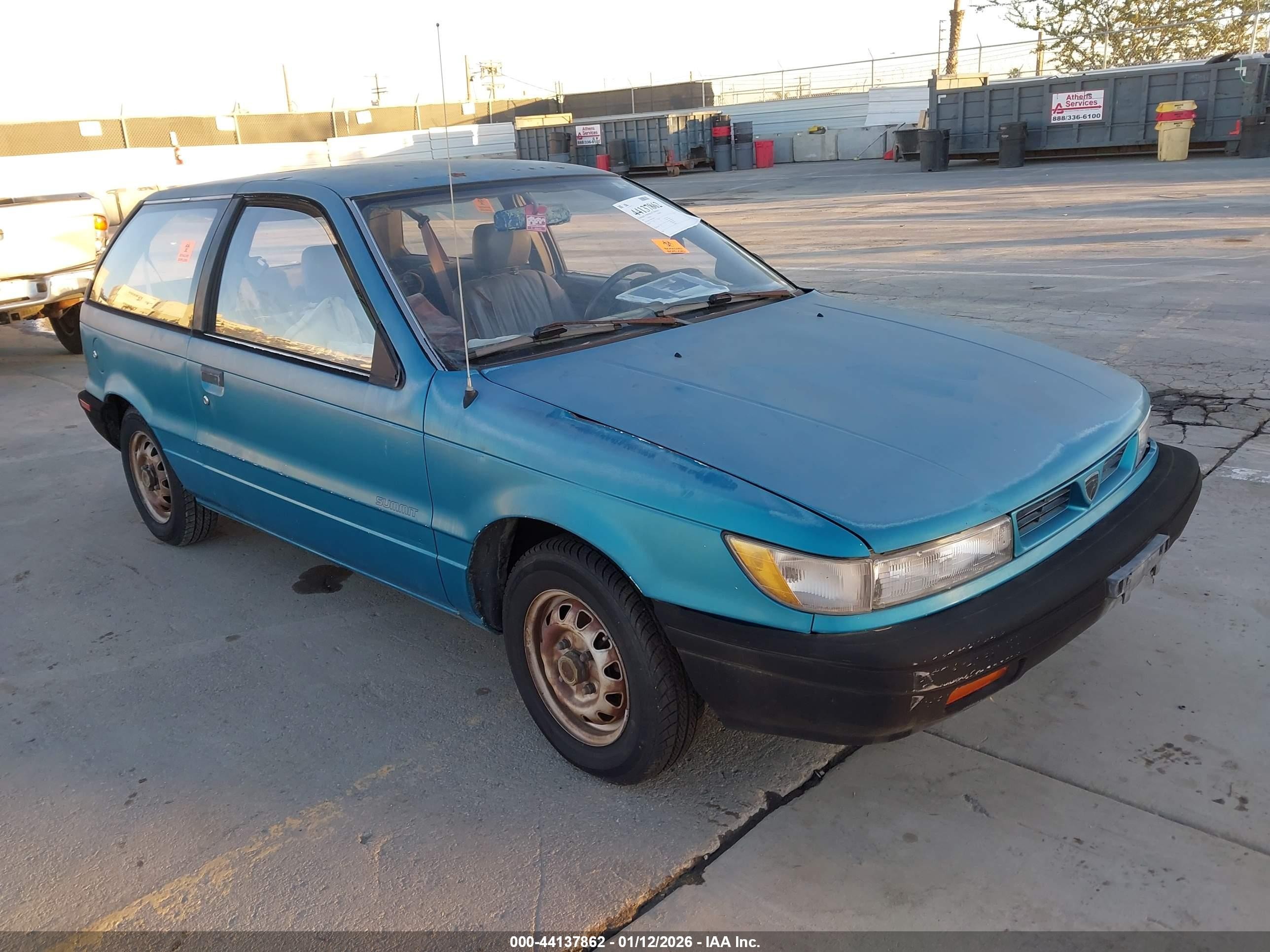 1991 Eagle Summit, VIN JE3CU14A9MU043786 — Бок