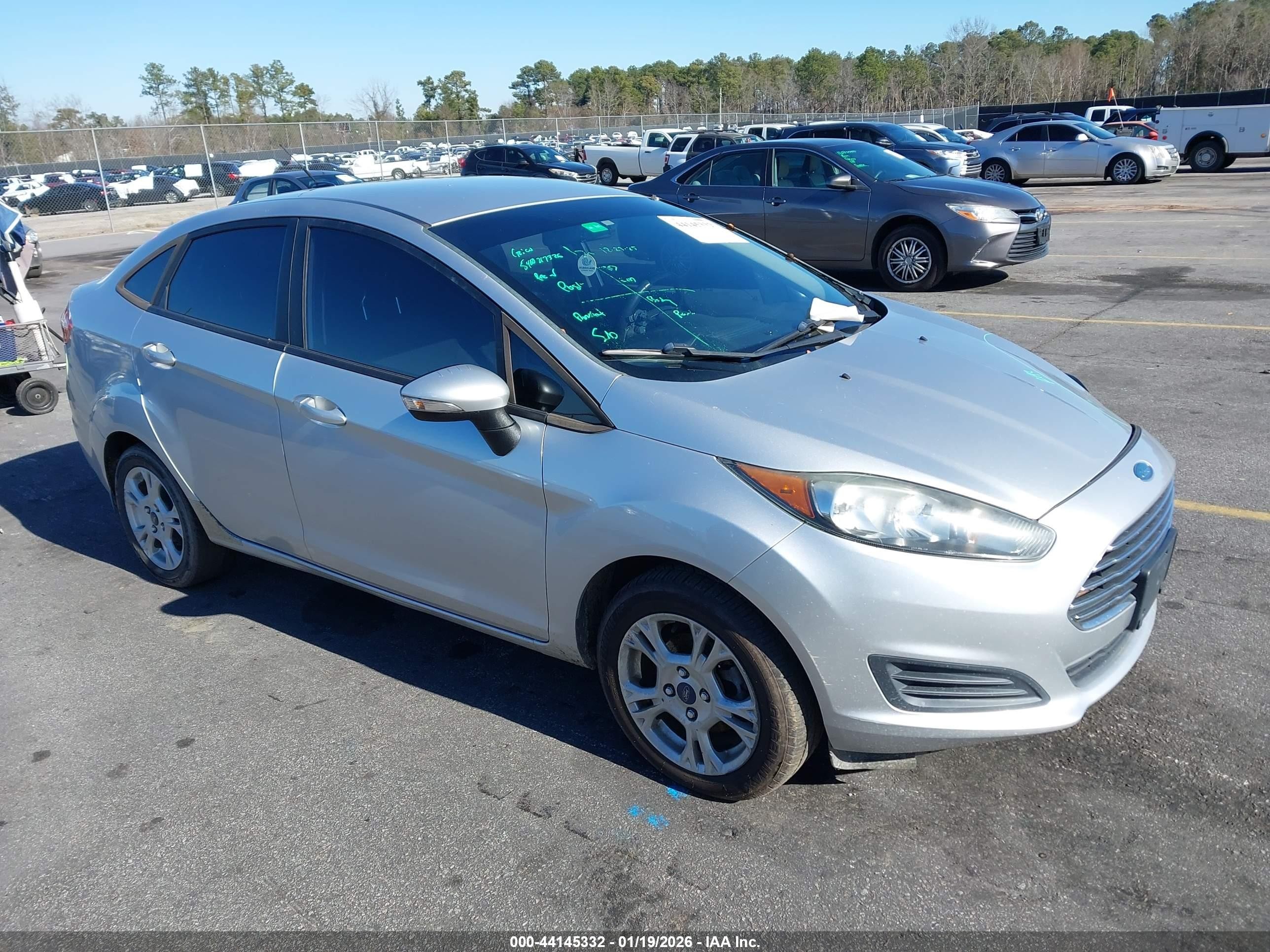 2016 Ford Fiesta SE, VIN 3FADP4BJ0GM135566 — Side