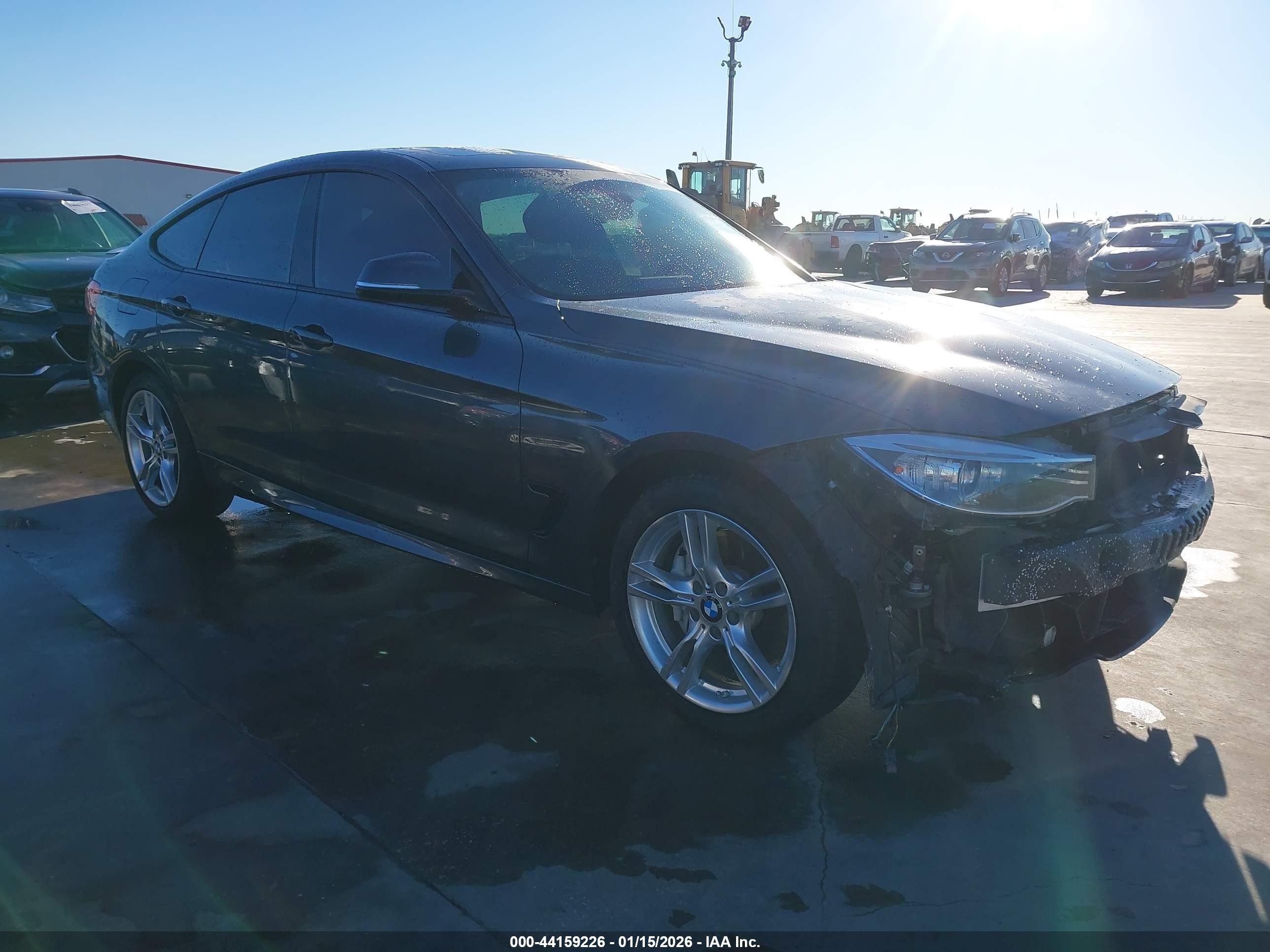 2014 BMW 3 Series 335i Gran Turismo xDrive, VIN WBA3X9C5XED867617 — Side