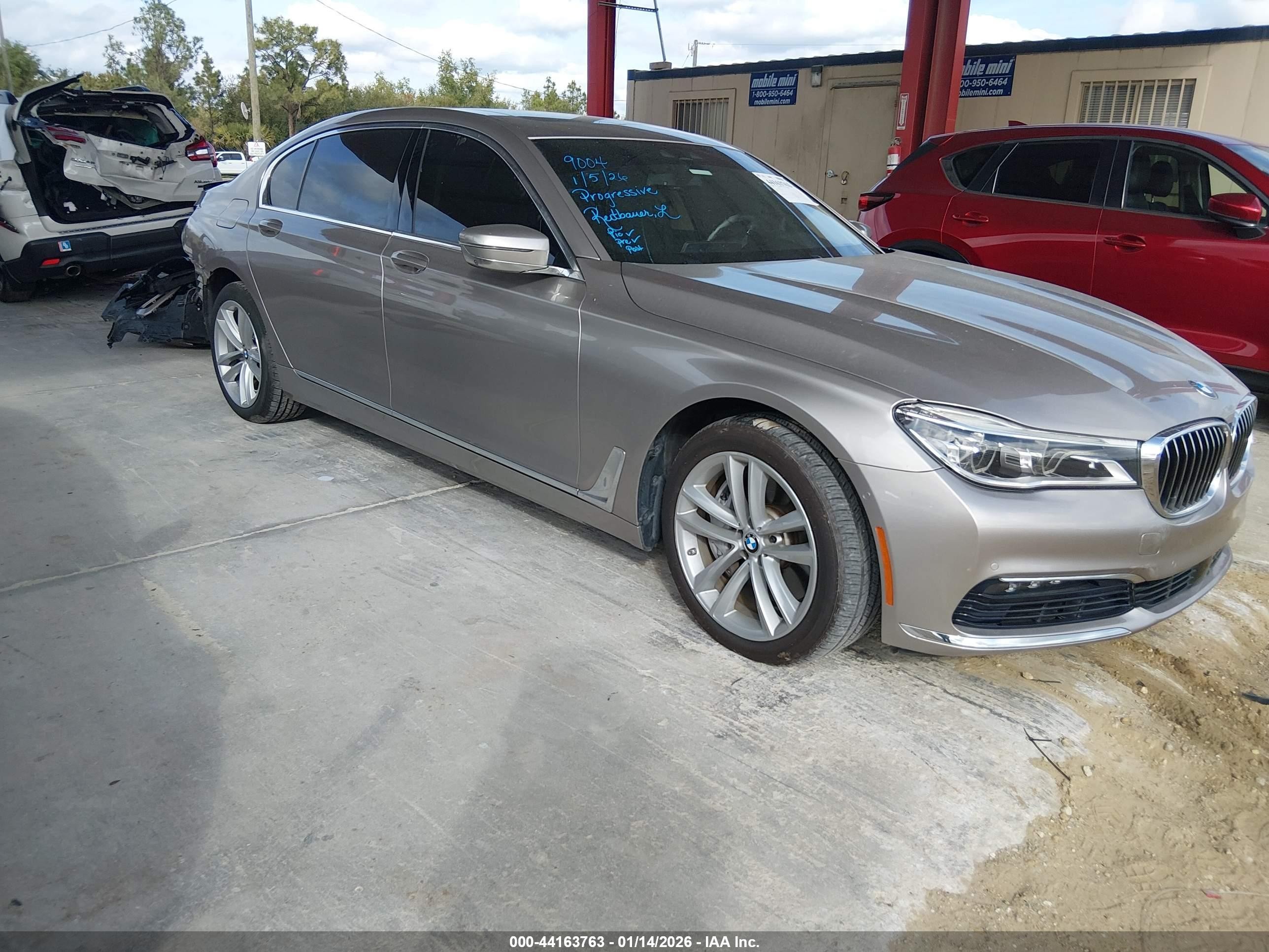 2016 BMW 7 Series 750i xDrive, VIN WBA7F2C59GG419673 — Rear end