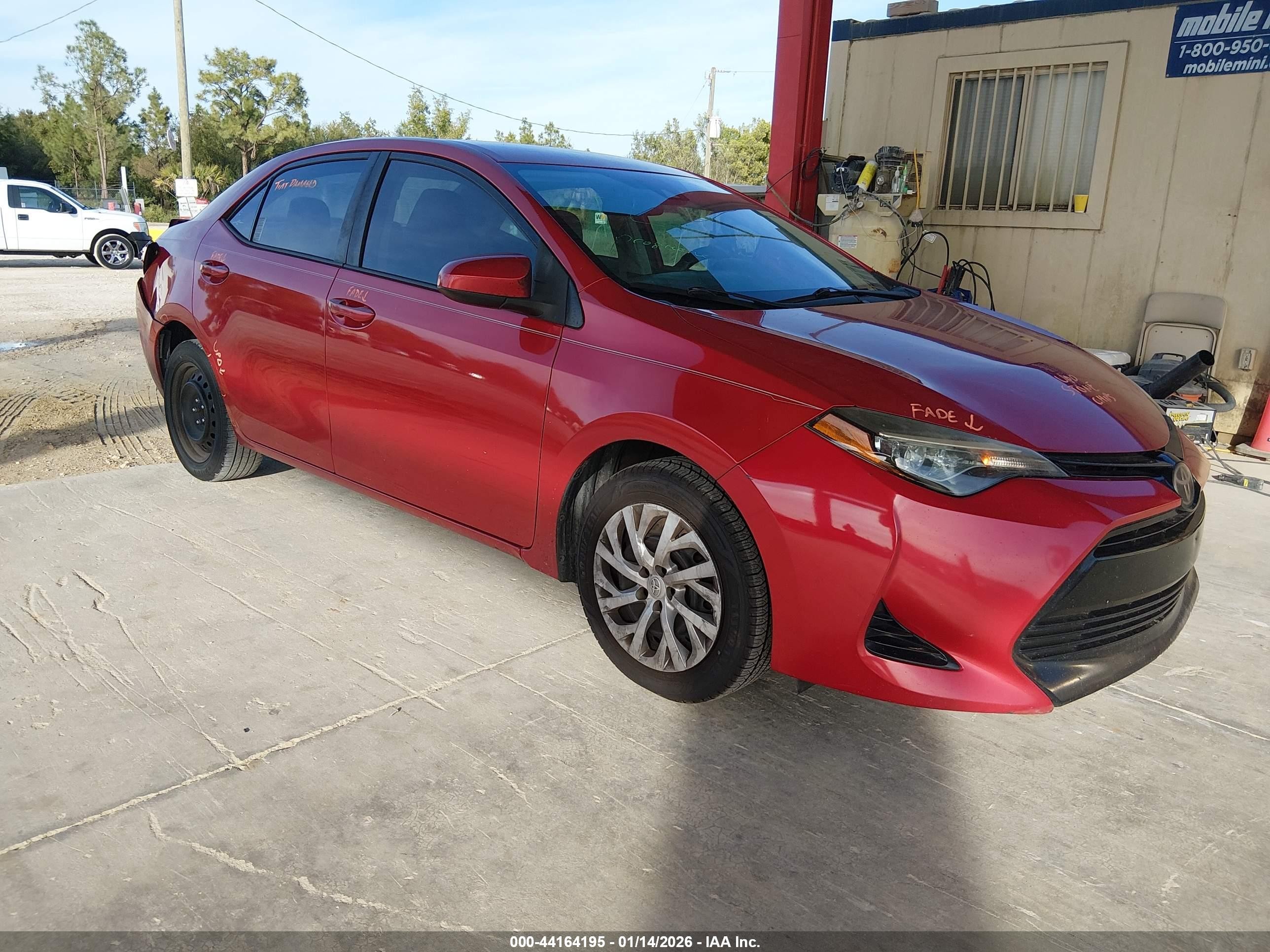2018 Toyota Corolla LE, VIN 5YFBURHE2JP834229 — Rear end