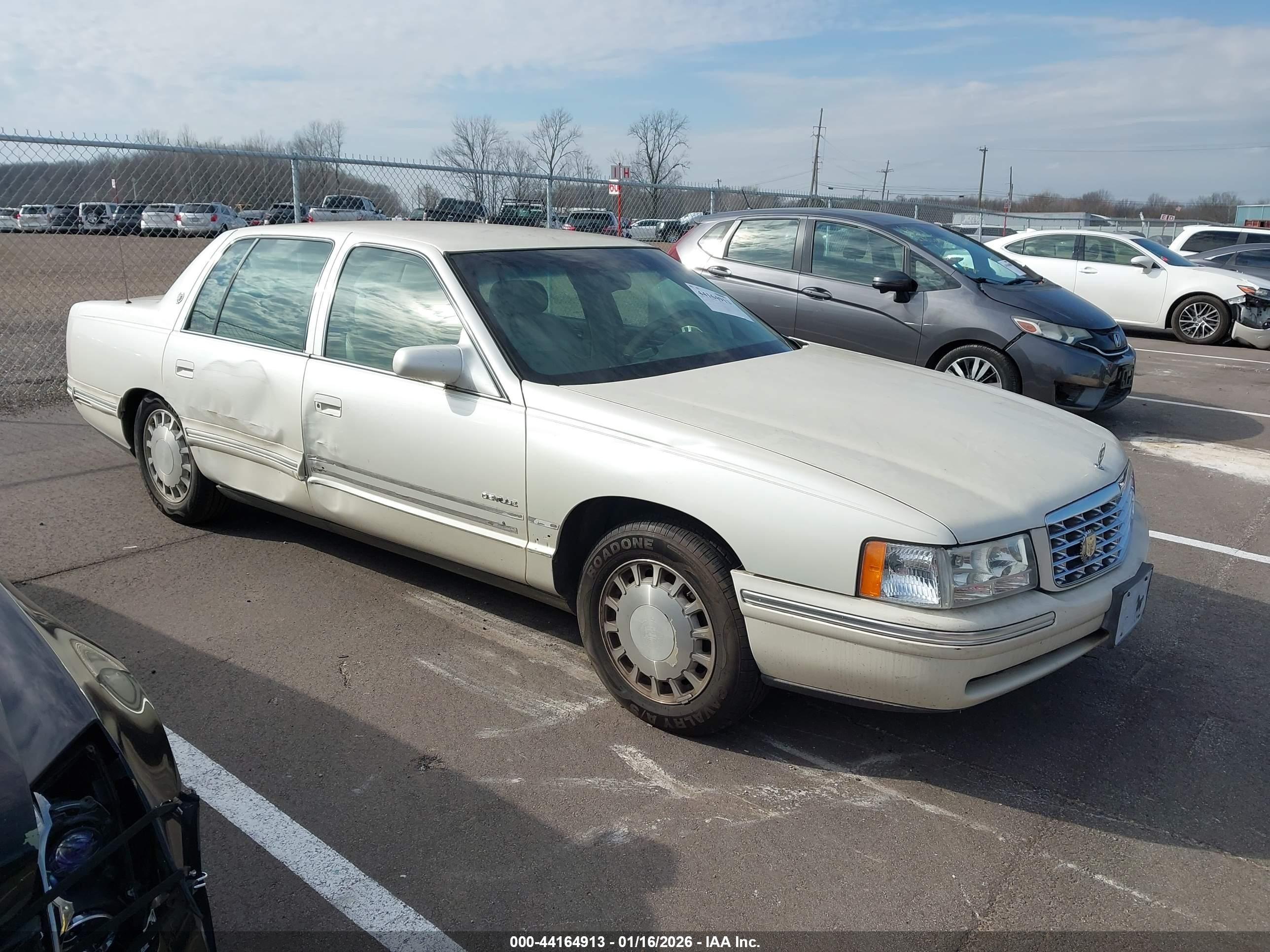 1998 Cadillac DeVille, VIN 1G6KD54Y5WU743266 — Side