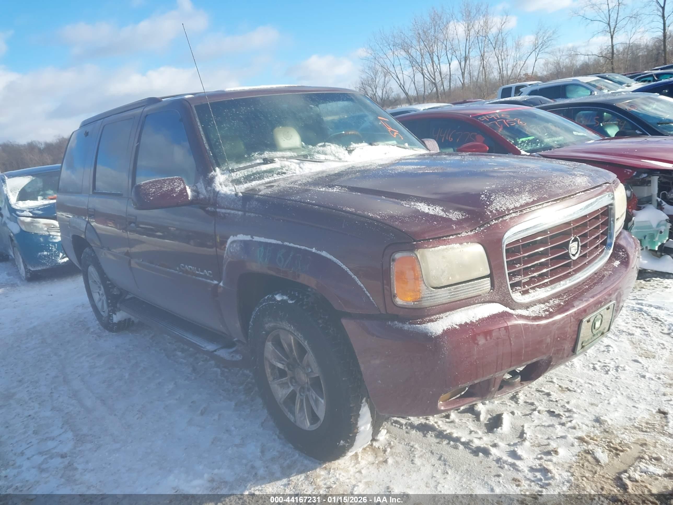 1999 Cadillac Escalade, VIN 1GYEK13R9XR403507 — Side