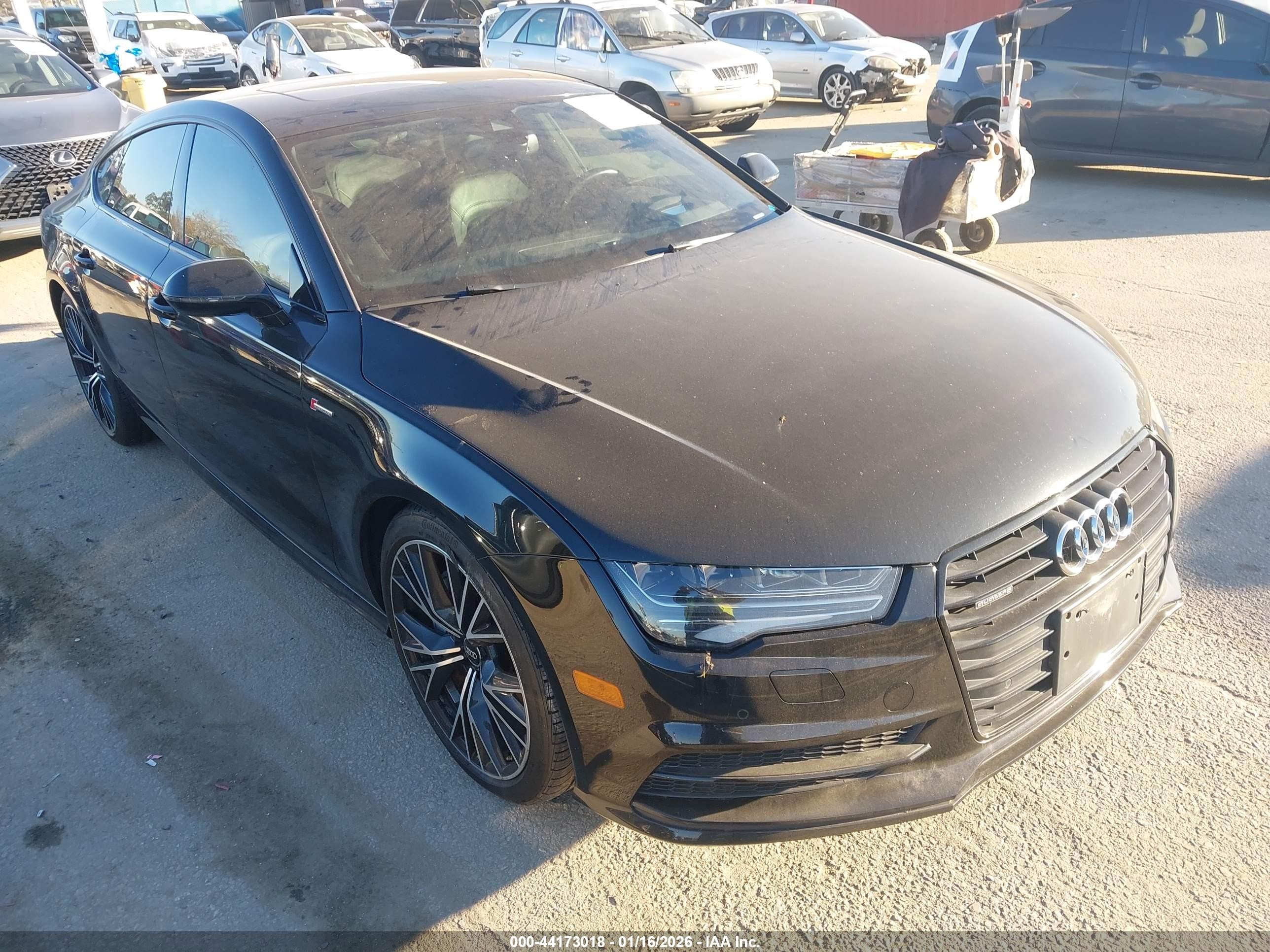 2016 Audi A7 Prestige, VIN WAU2GAFC5GN031864 — Зад