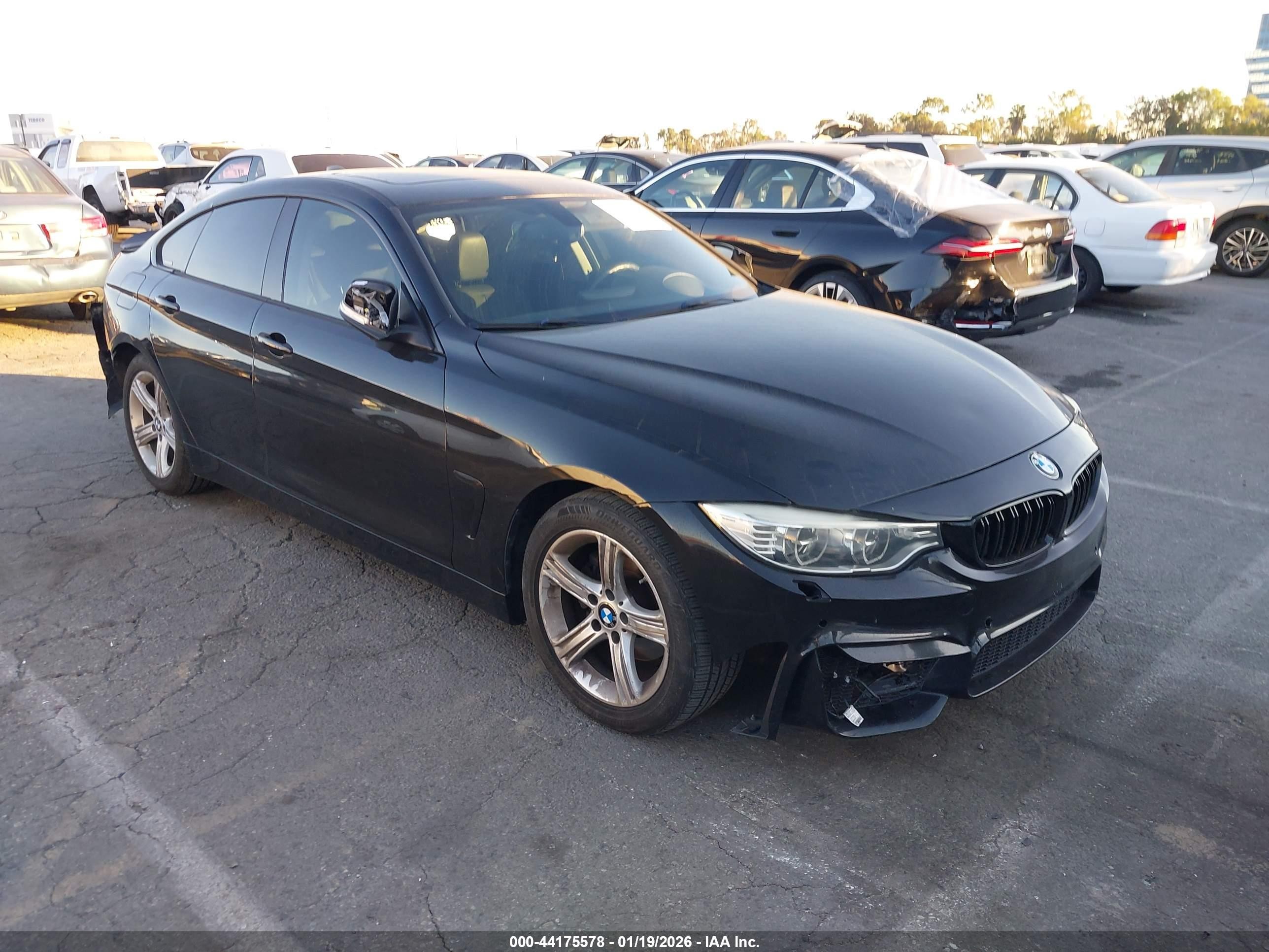2015 BMW 4 Series 428i, VIN WBA4A9C5XFD416078 — Rear end