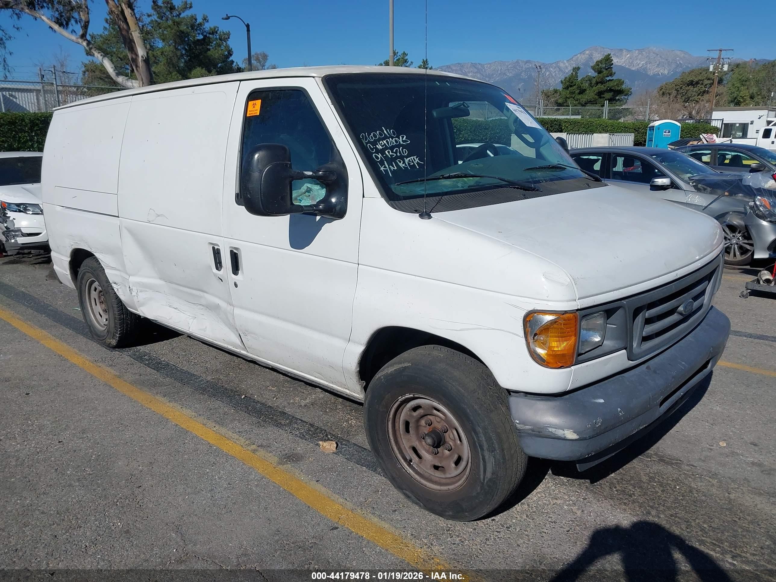 2006 Ford E-150, VIN 1FTRE14L76DA54495 — Side