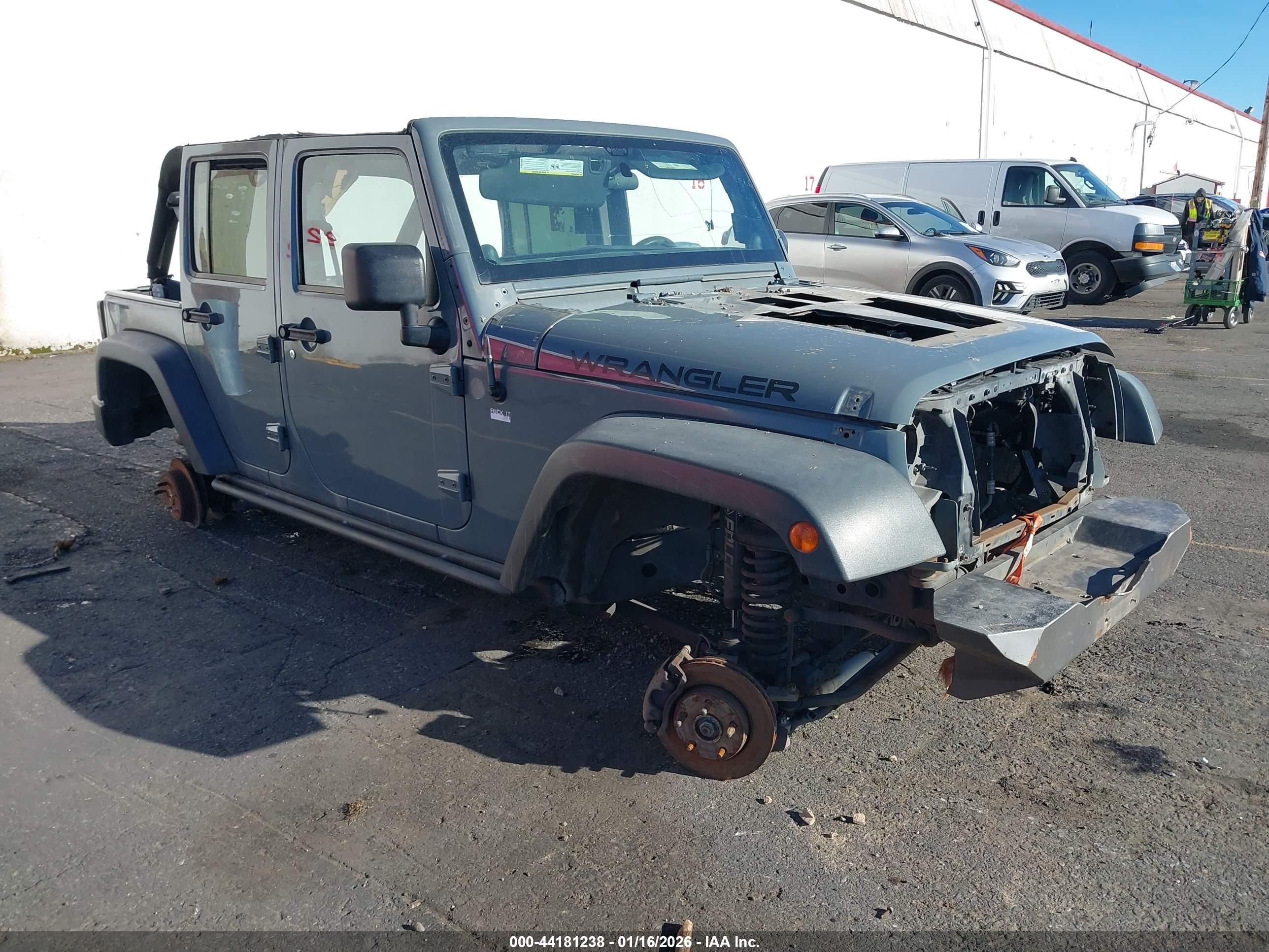 2014 Jeep Wrangler Unlimited Sport, VIN 1C4BJWDGXEL129482 — Stripped
