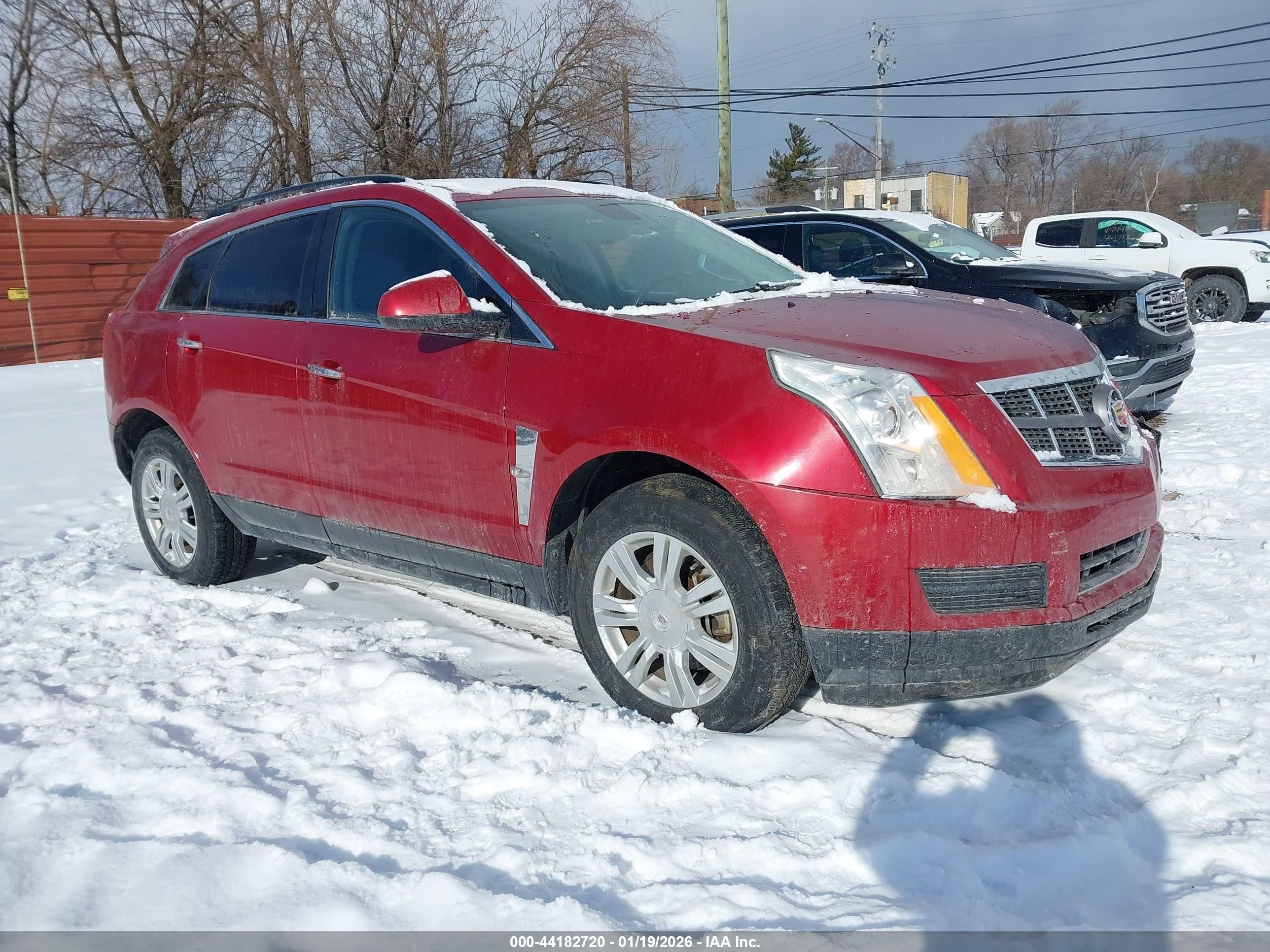 2012 Cadillac SRX, VIN 3GYFNGE39CS655420 — Auction photo