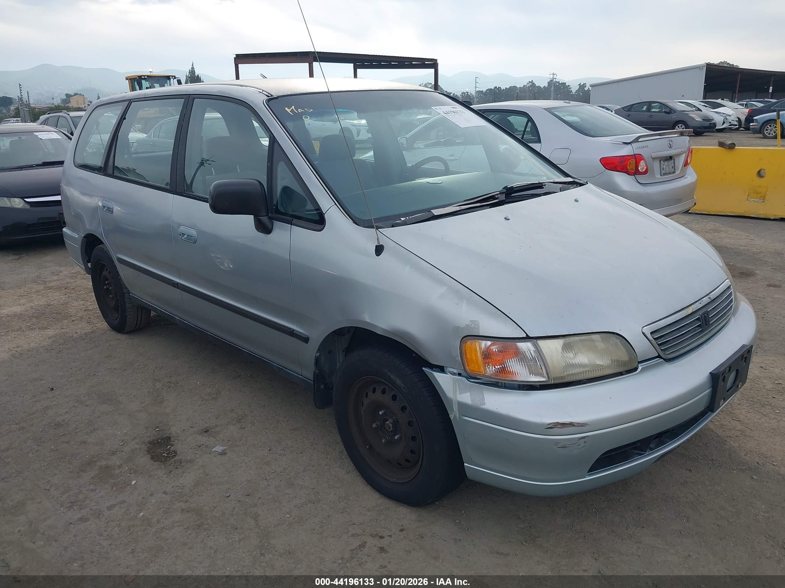 1997 Honda Odyssey LX, VIN JHMRA1864VC010795 — Side